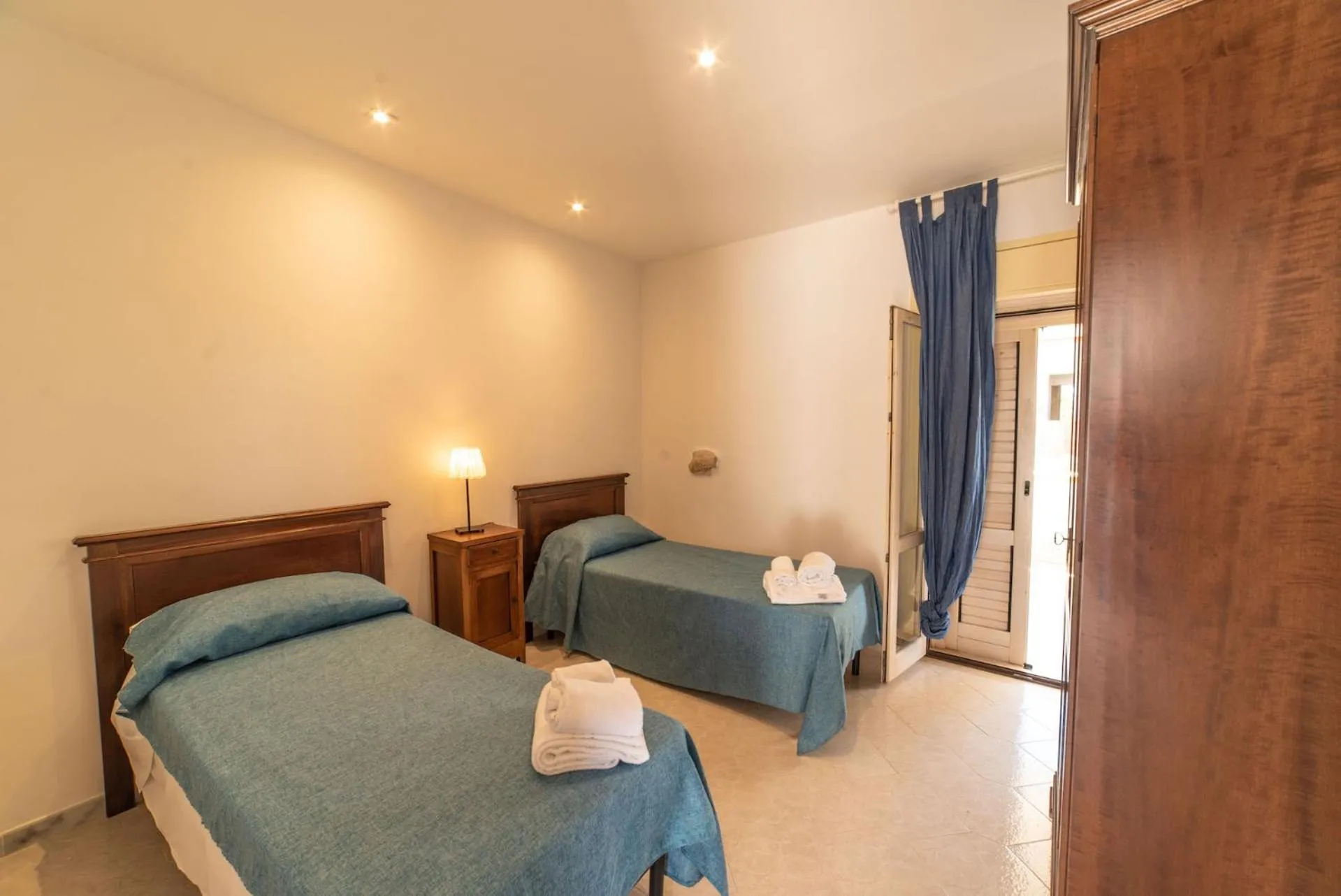 Photo of the whole room, Bed in Borgo Marino Plemmirio