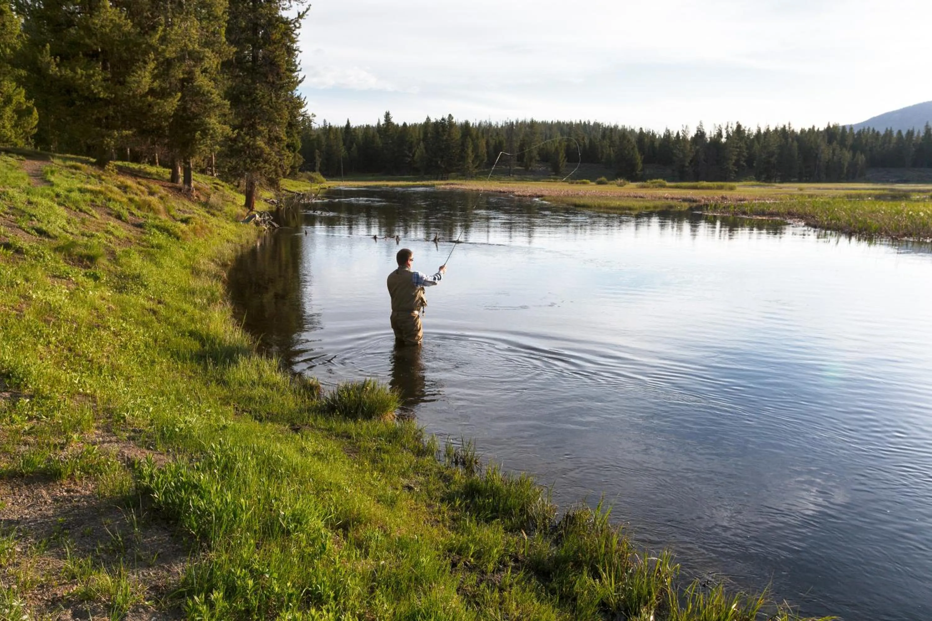 Fishing in Headwaters Lodge & Cabins at Flagg Ranch