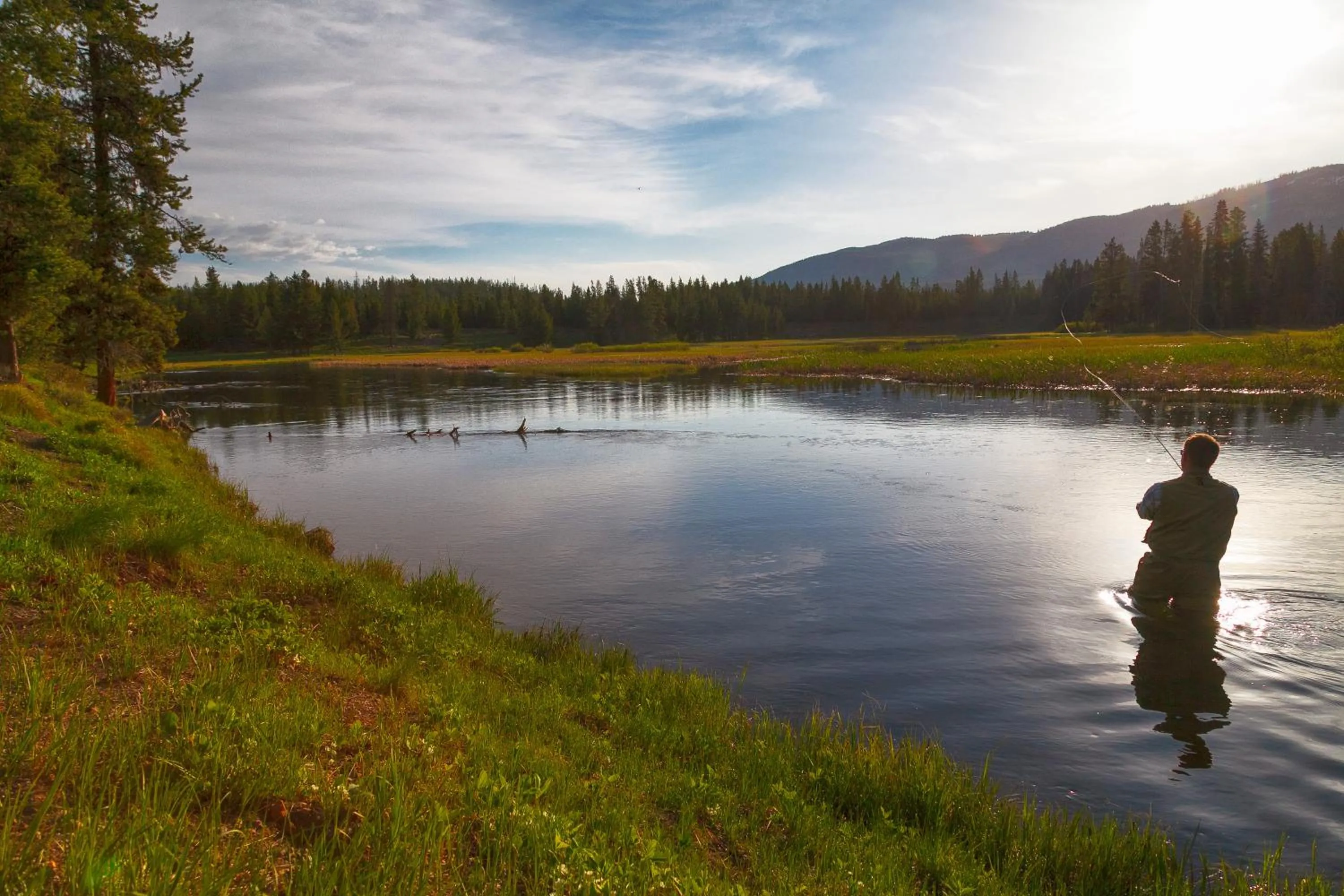 Fishing in Headwaters Lodge & Cabins at Flagg Ranch