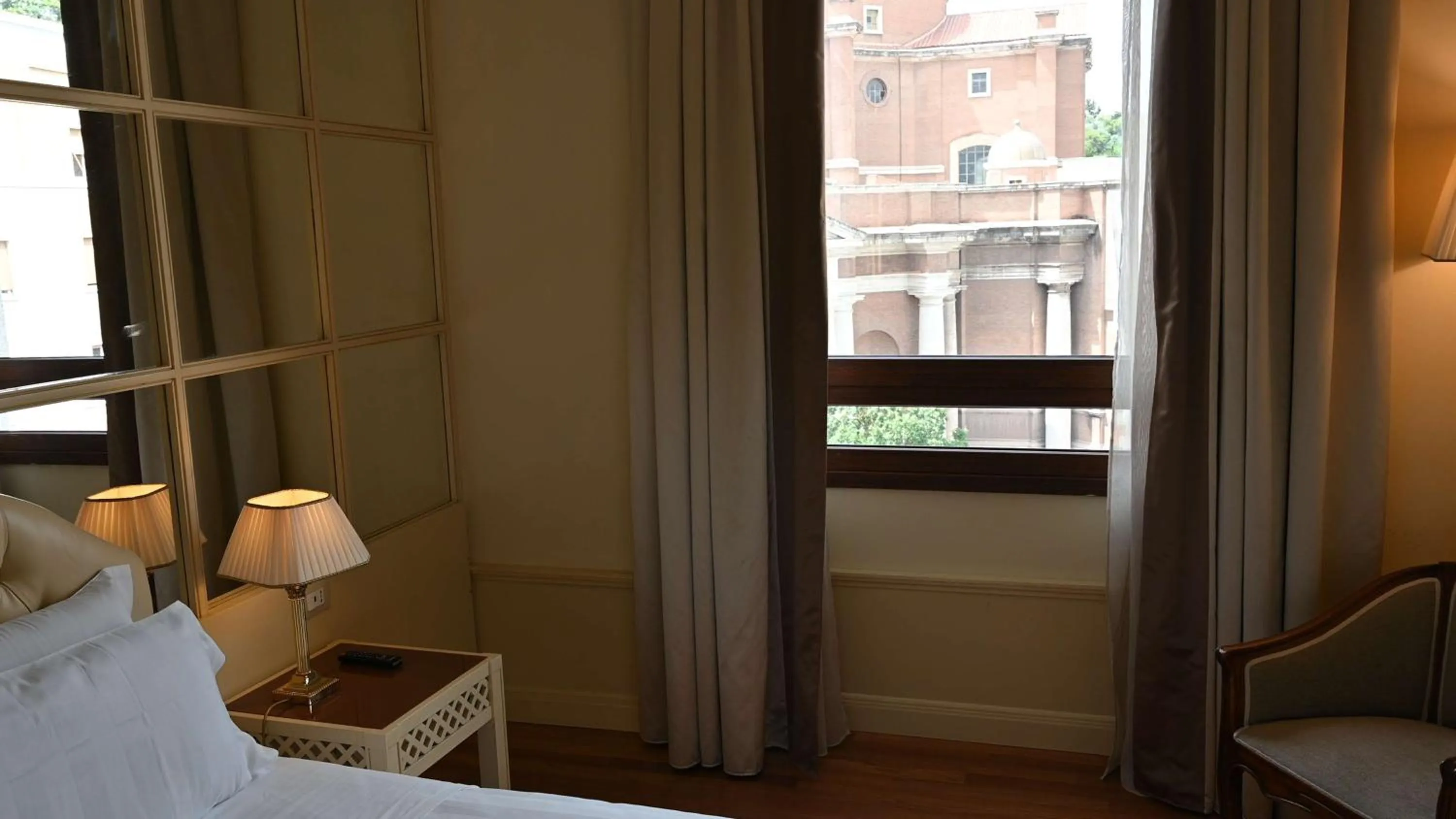 View (from property/room), Bed in Radisson Blu GHR Rome