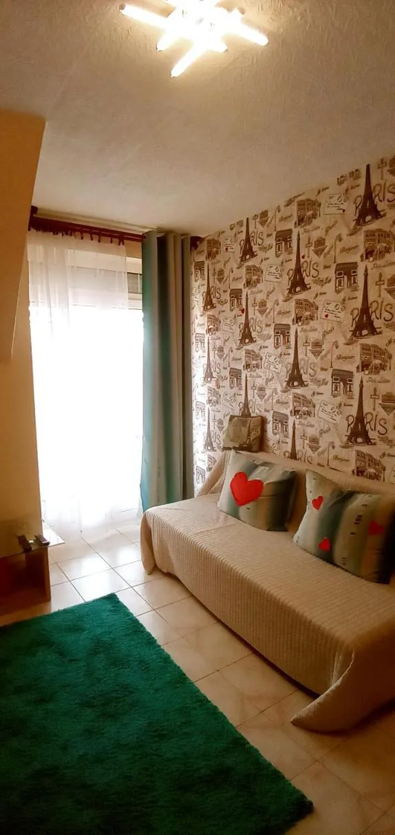 Living room, Bed in Valloris Apartments