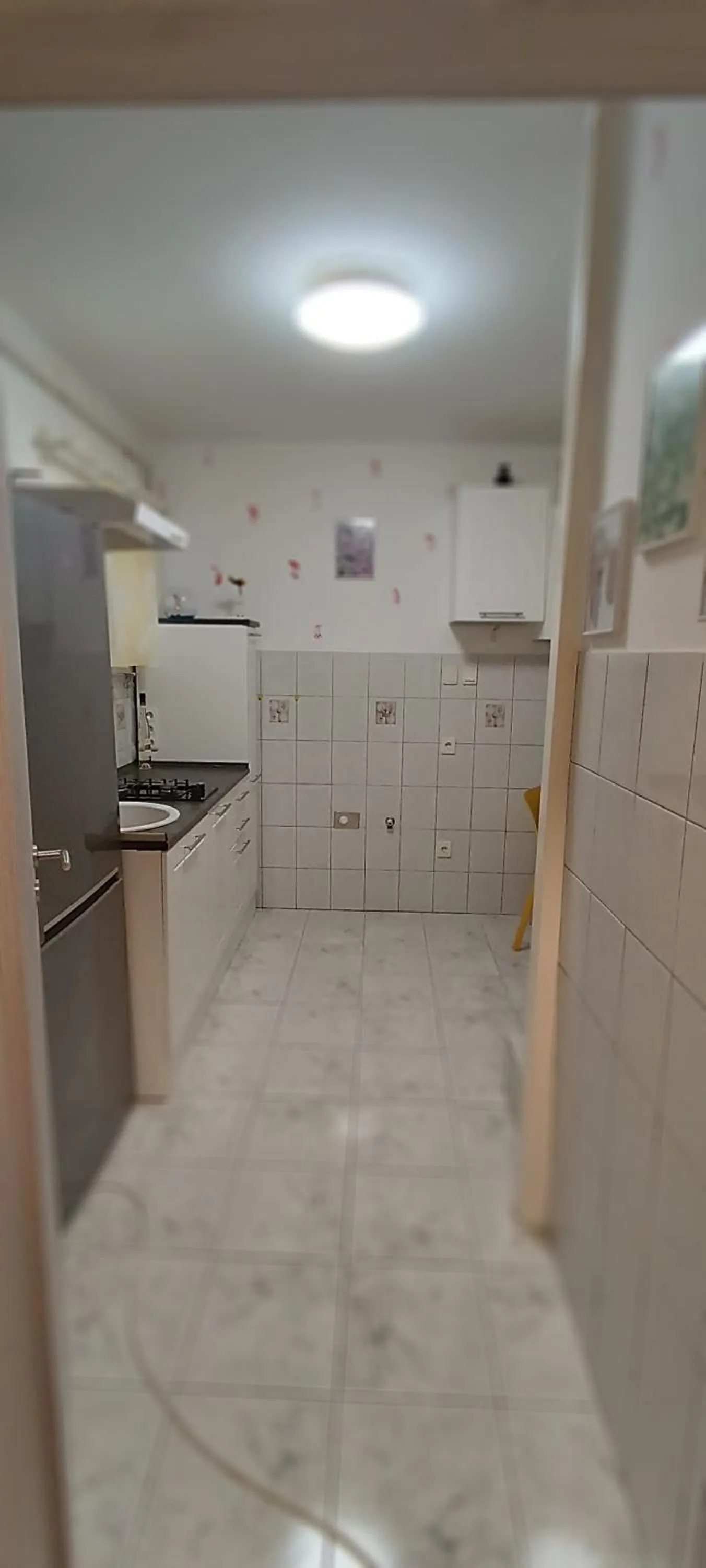 Kitchen or kitchenette in Valloris Apartments
