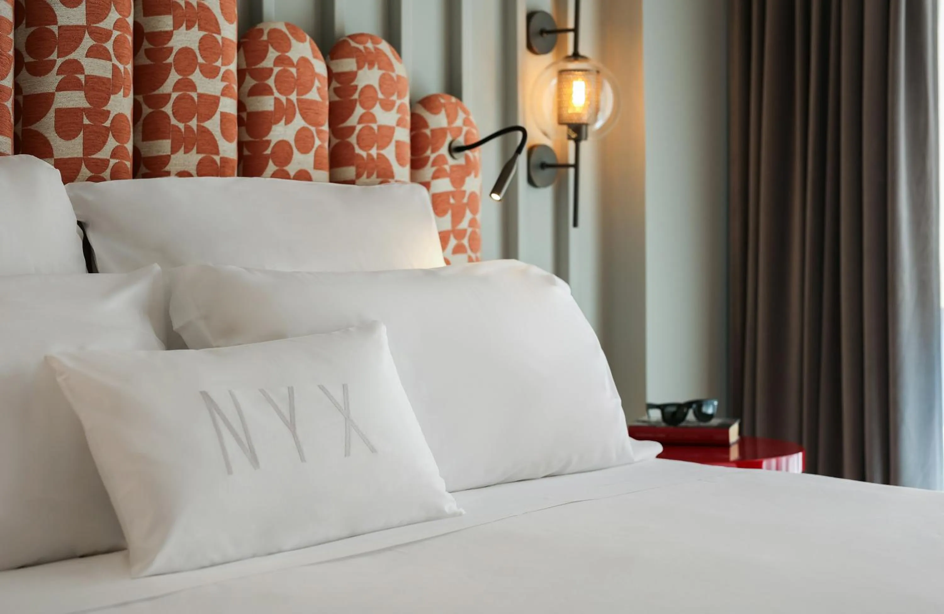 Photo of the whole room, Bed in NYX Hotel Rome by Leonardo Hotels