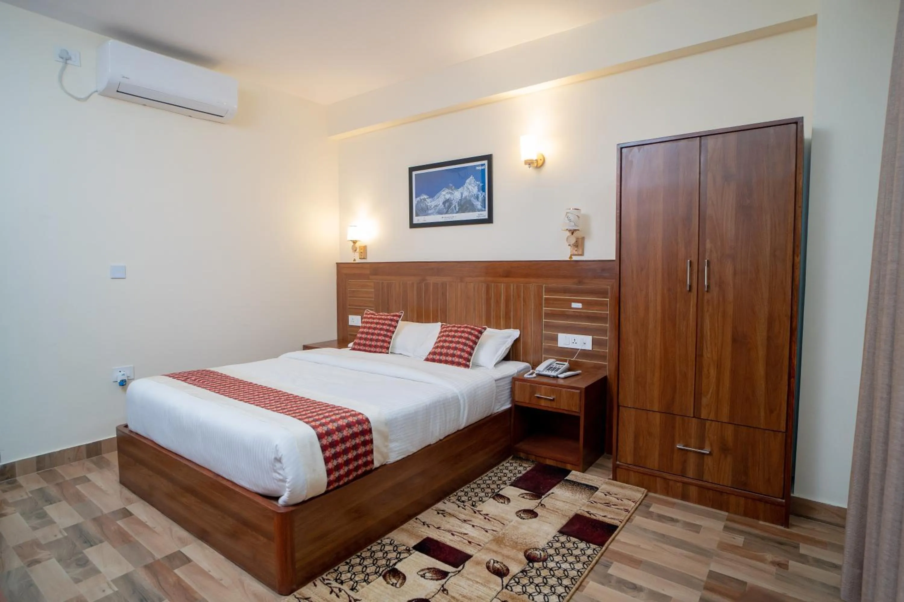 Bed in Madhuban Hotel