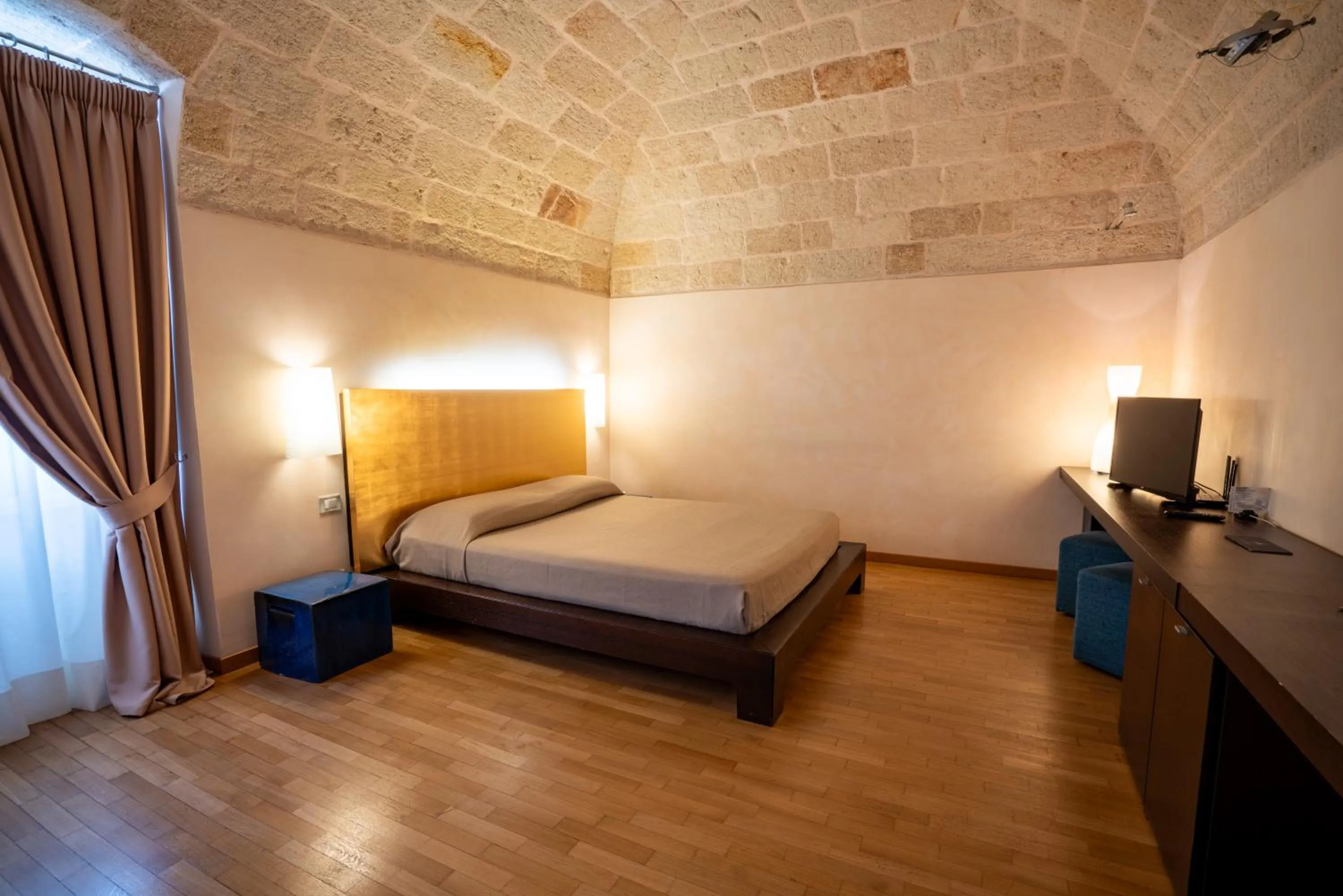 Bed in San Tommaso Hotel