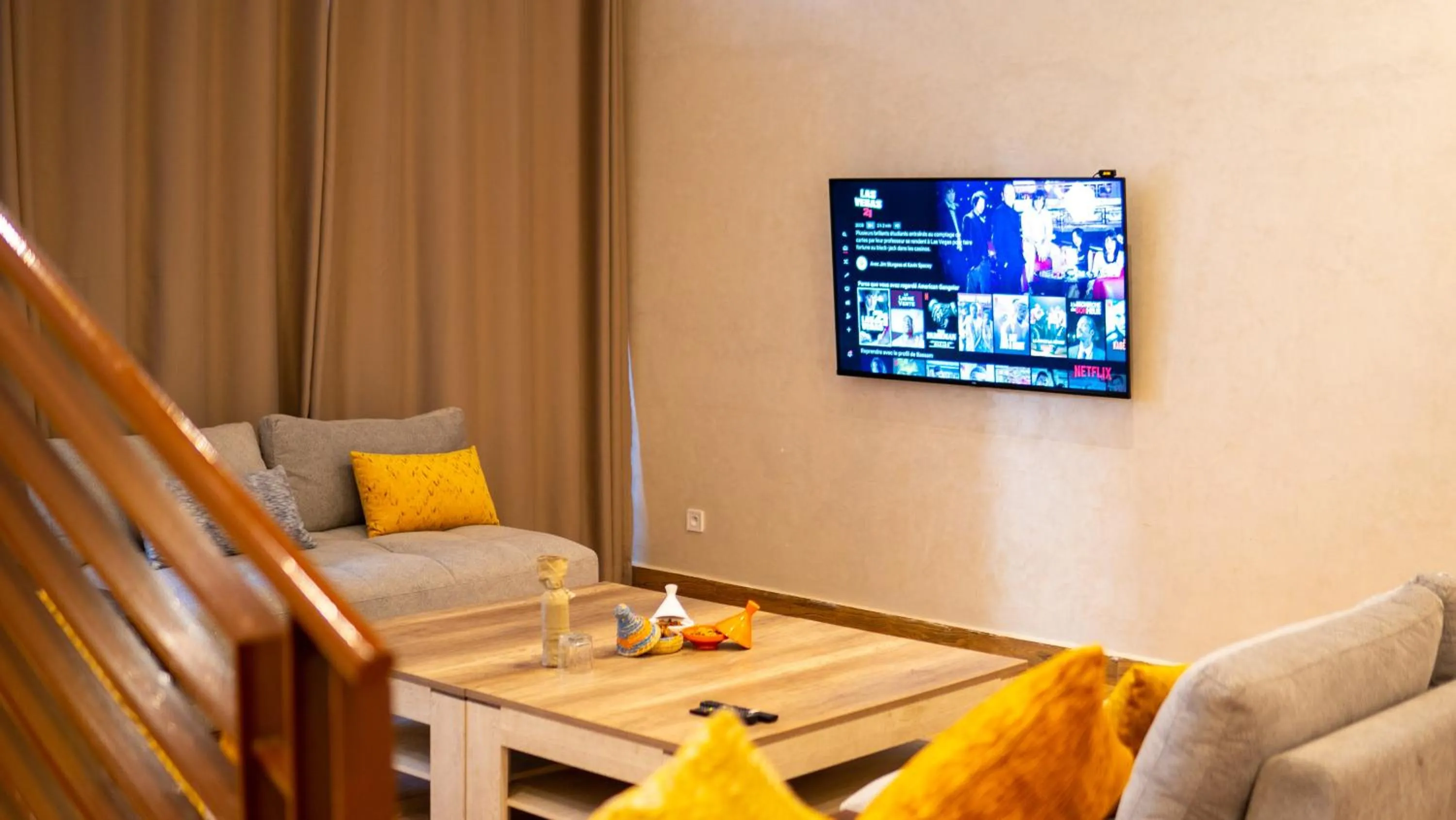 Communal lounge/ TV room in Riad villa saphir & SPA