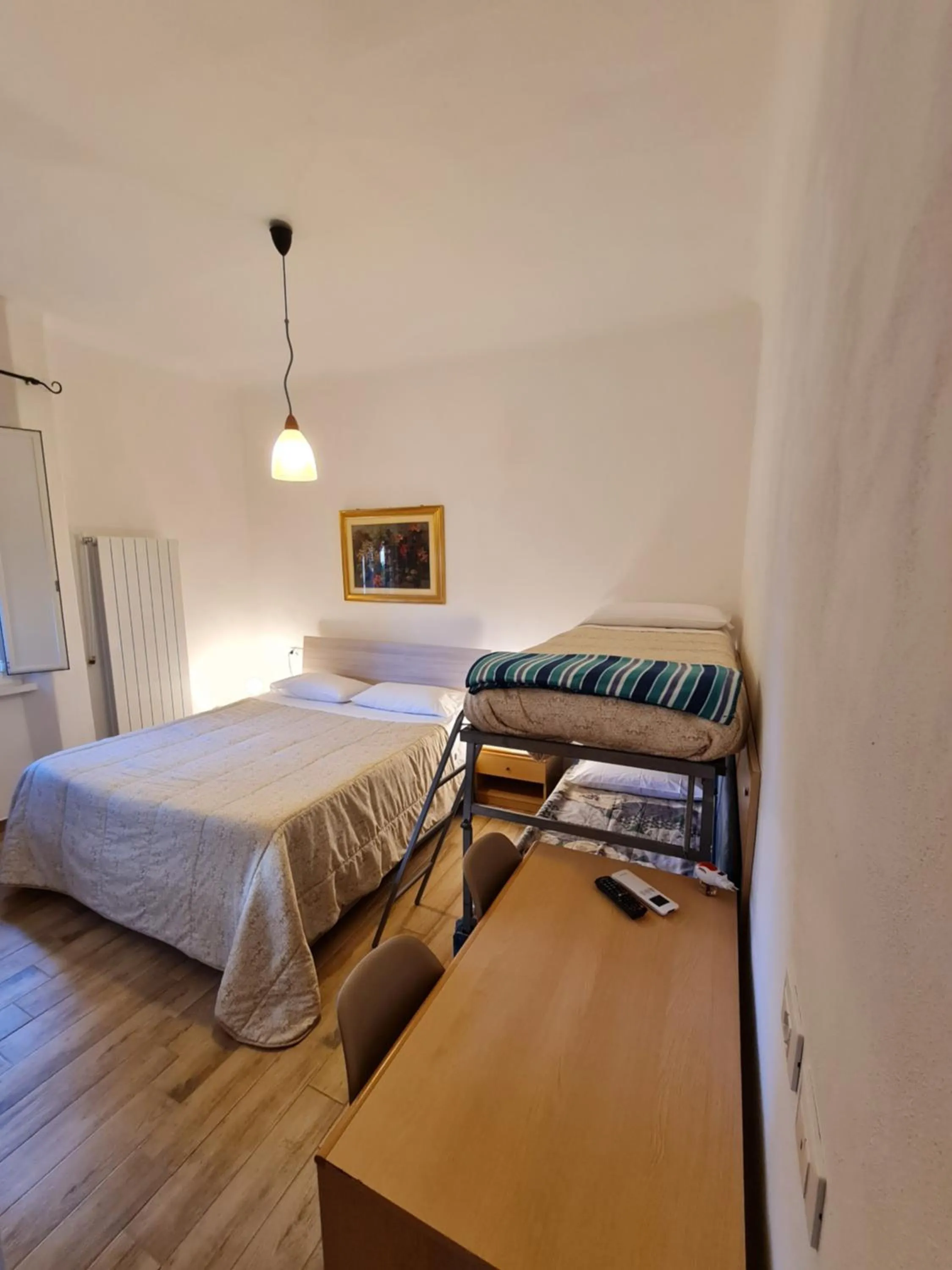 Bed in Albergo Genio