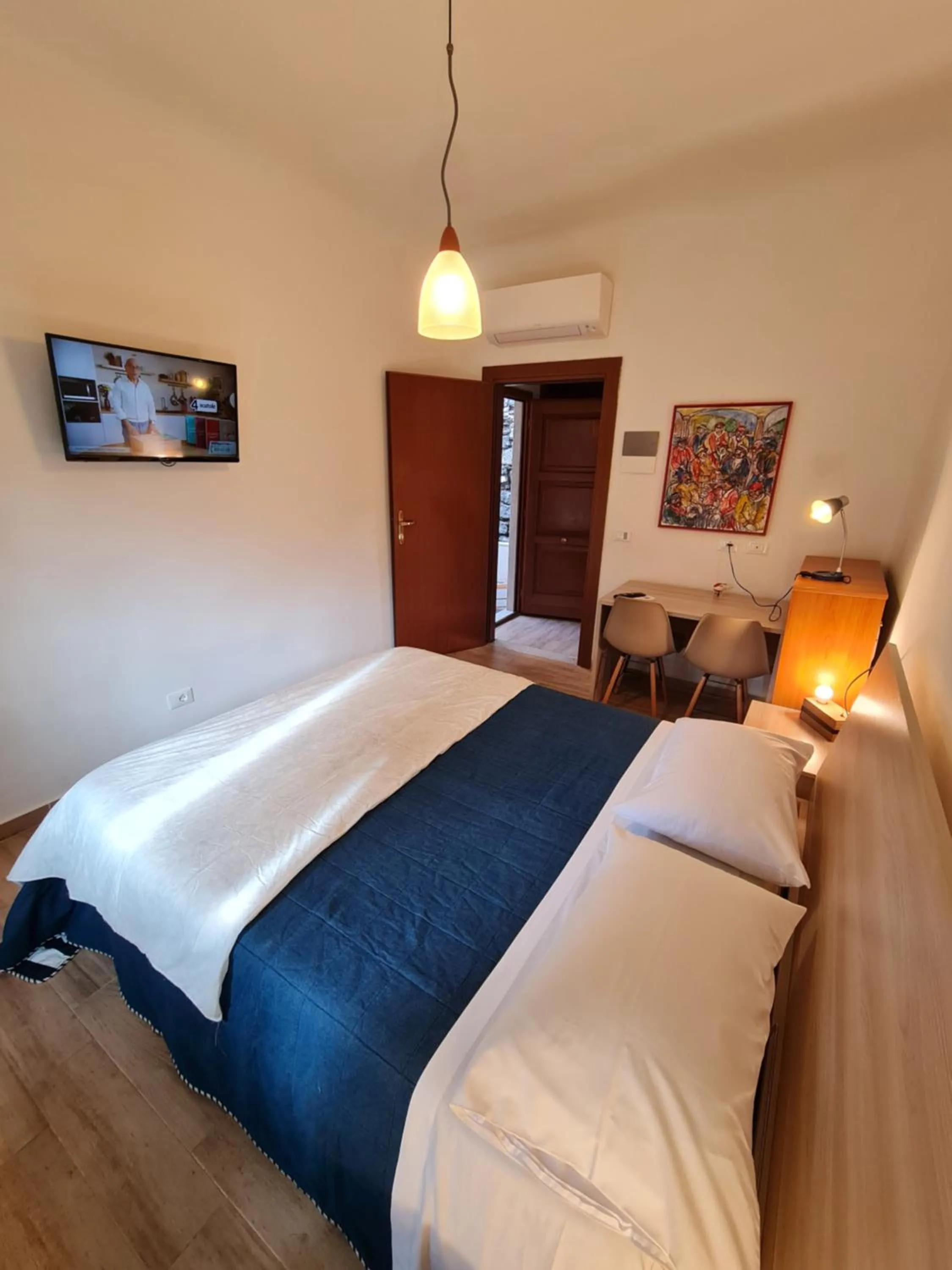 View (from property/room), Bed in Albergo Genio