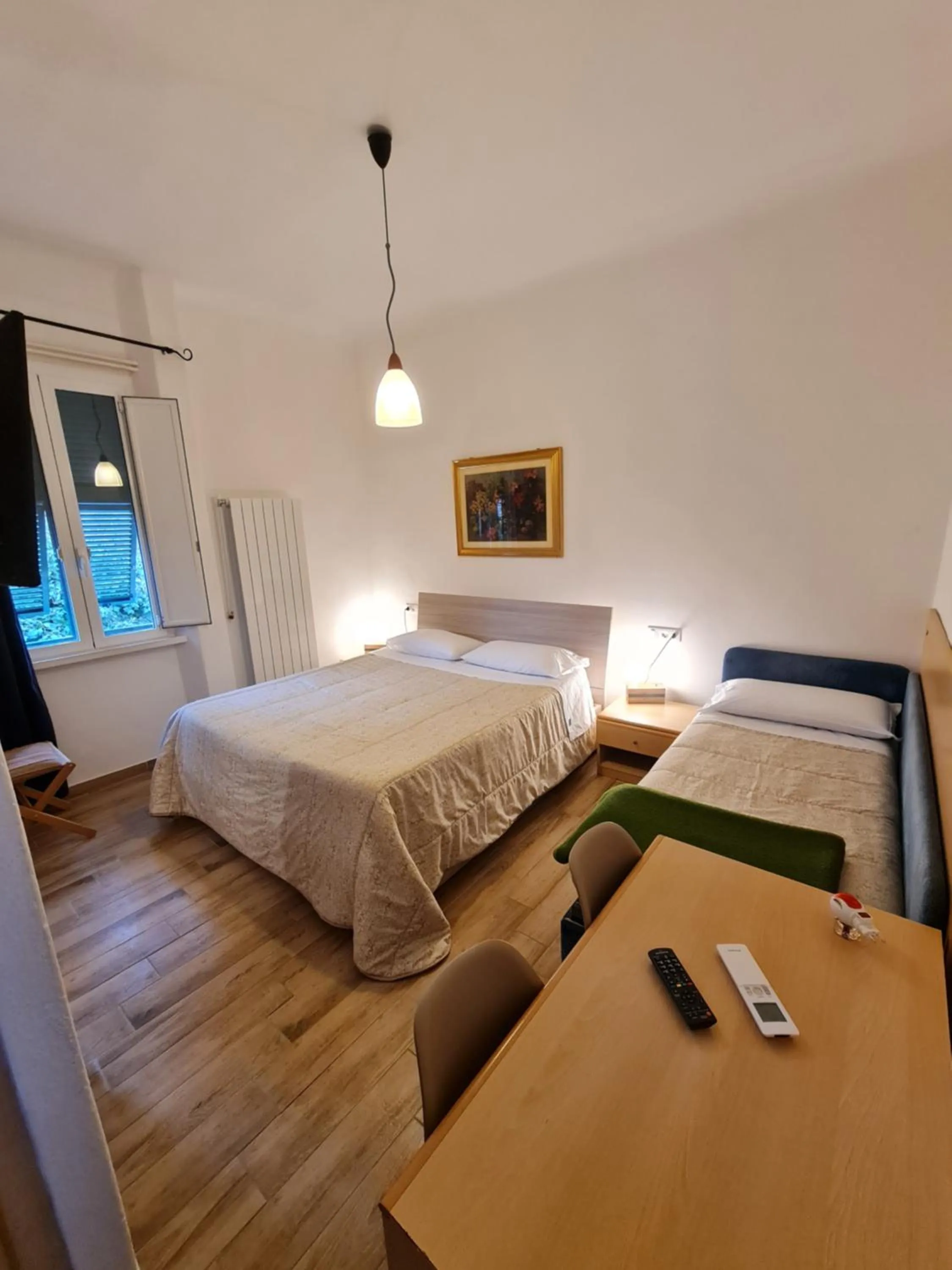 View (from property/room), Bed in Albergo Genio