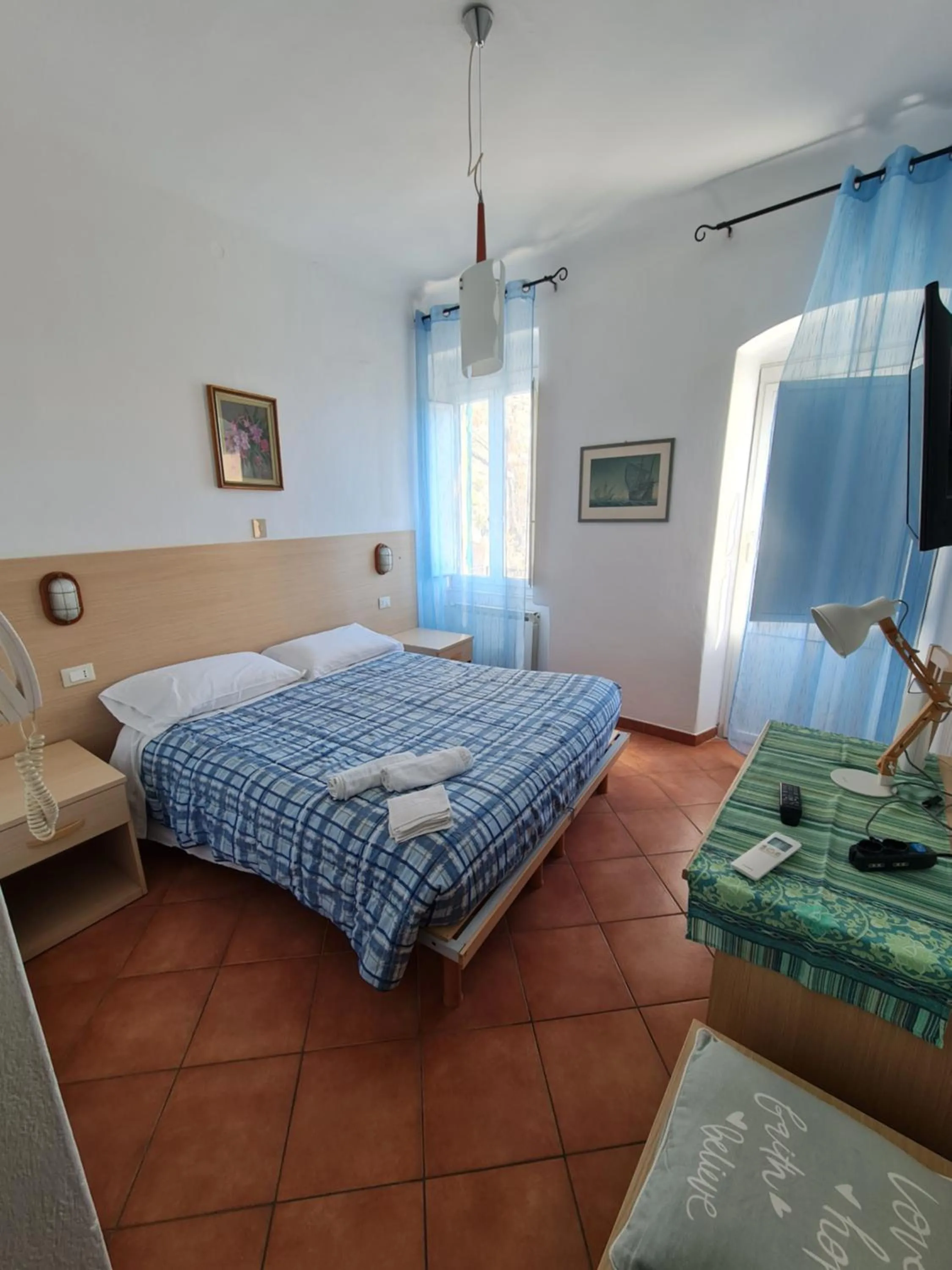 Bed in Albergo Genio