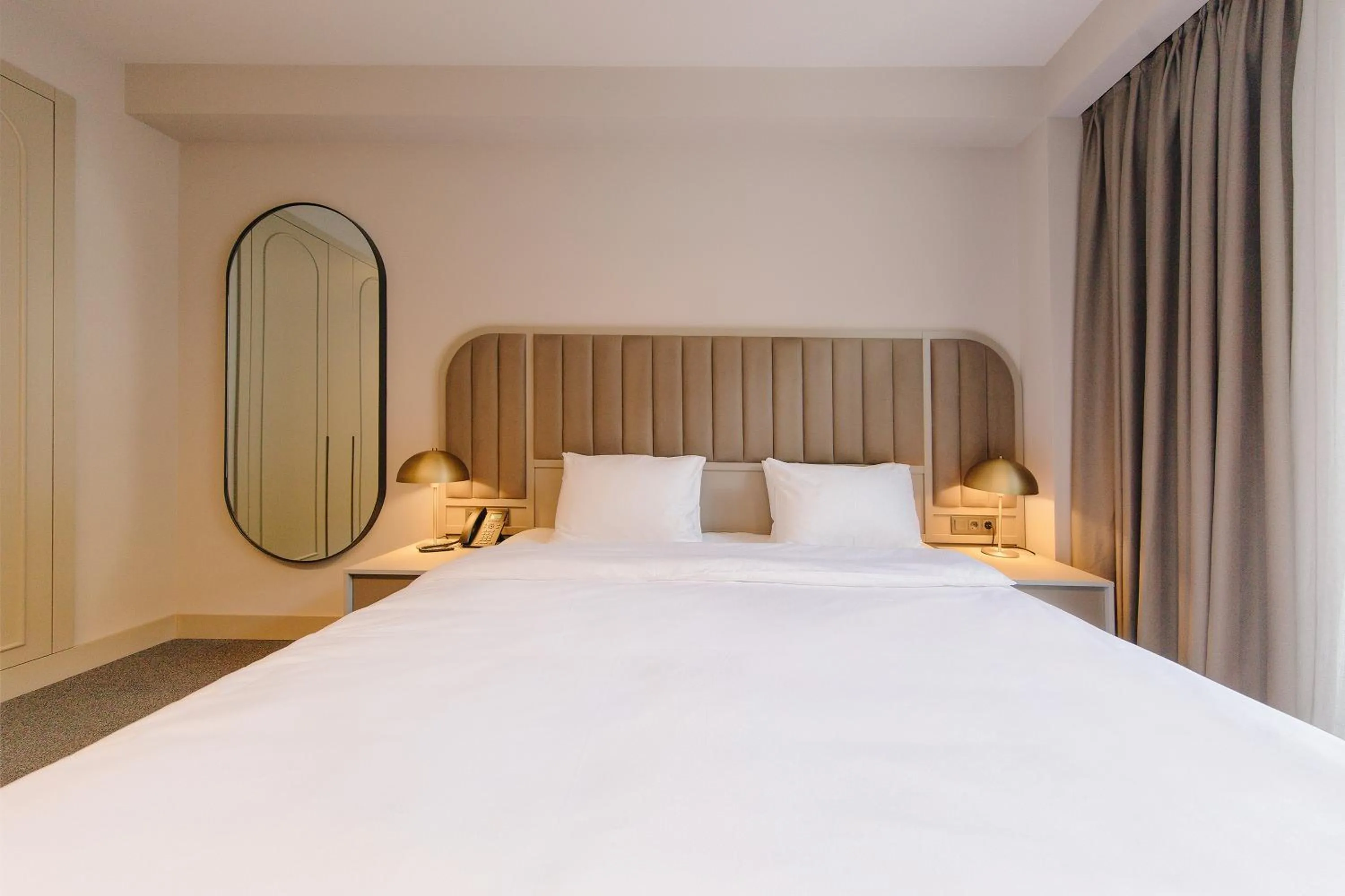Bed in STROFI Boutique Hotel