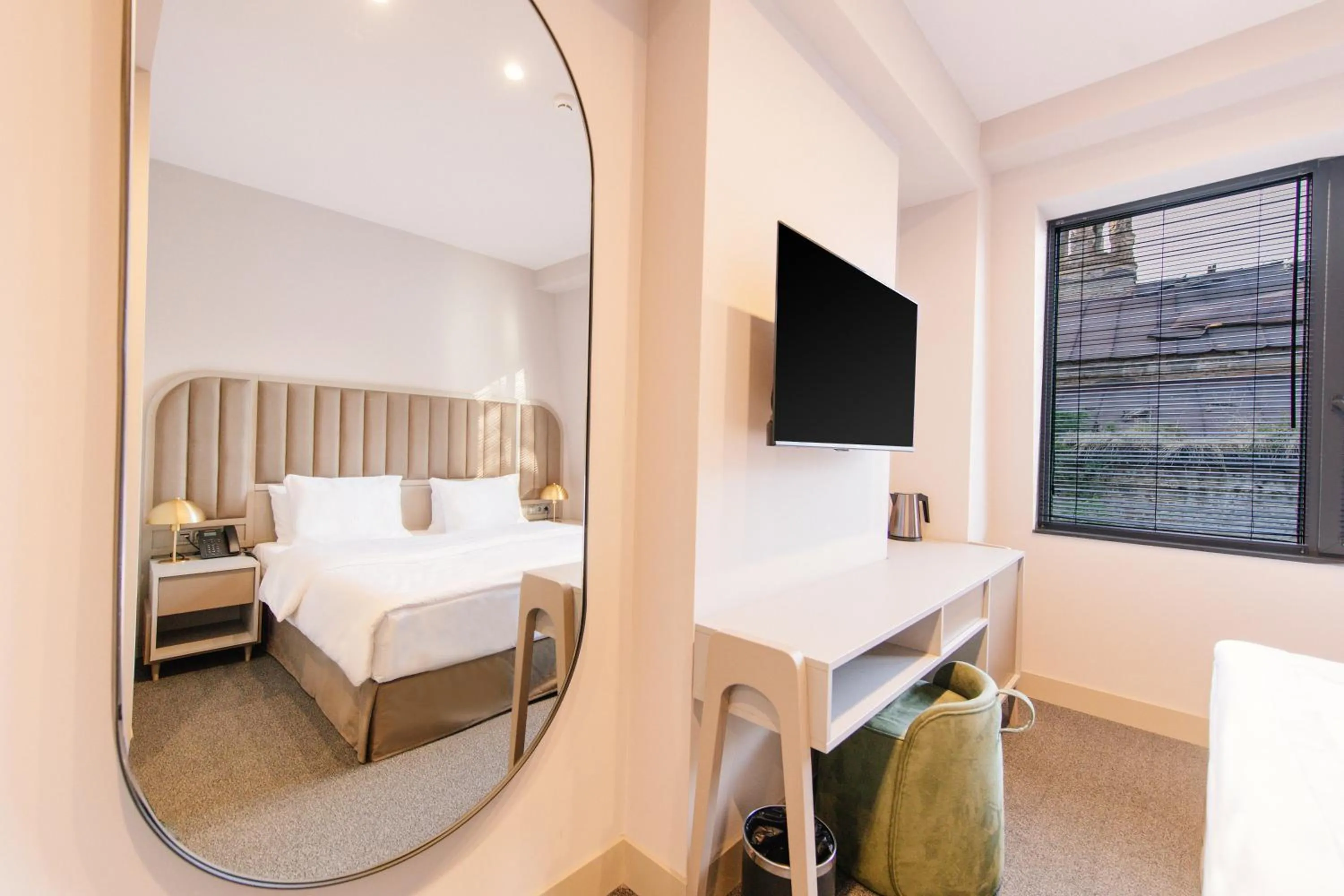 Bed in STROFI Boutique Hotel