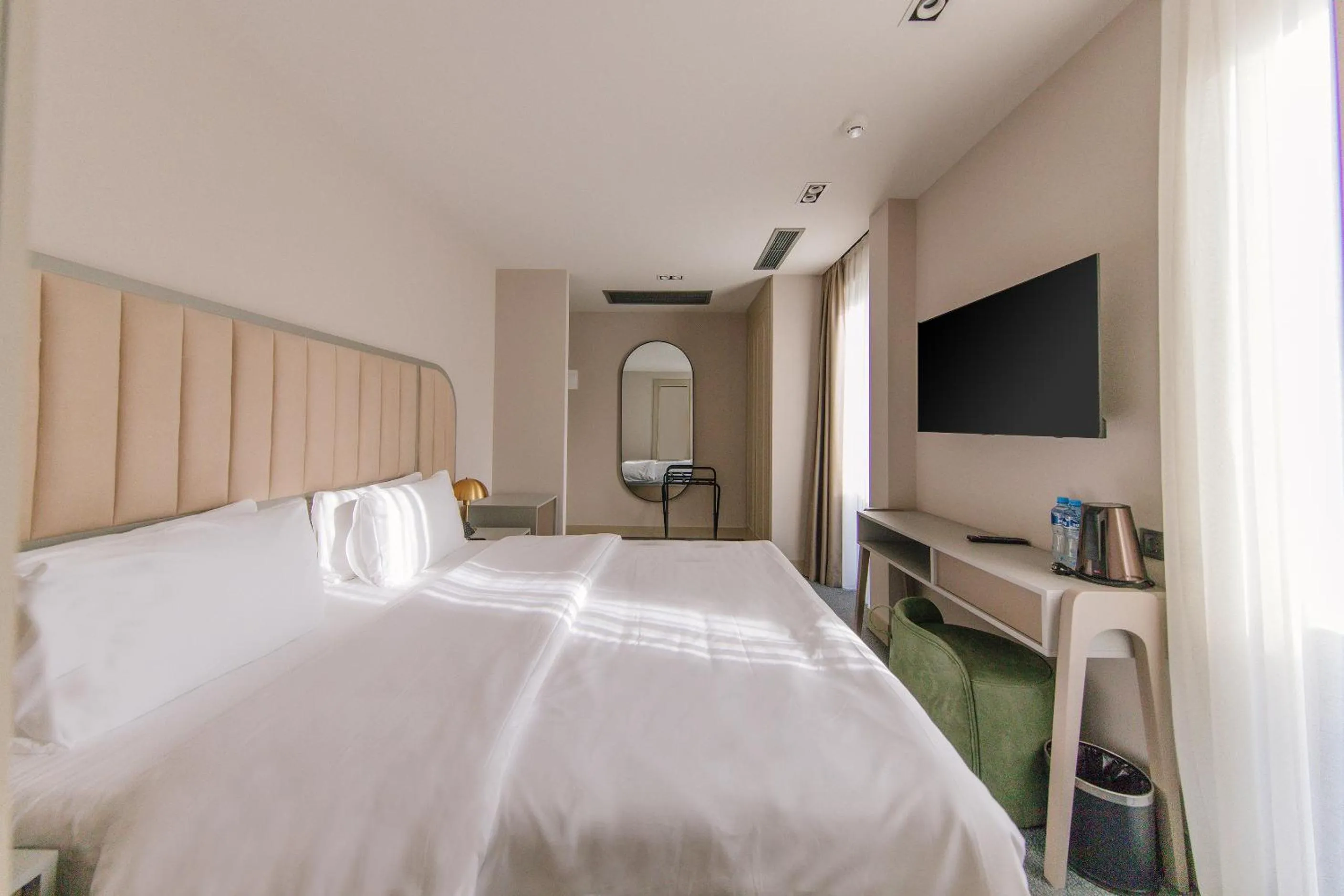 Bed in STROFI Boutique Hotel