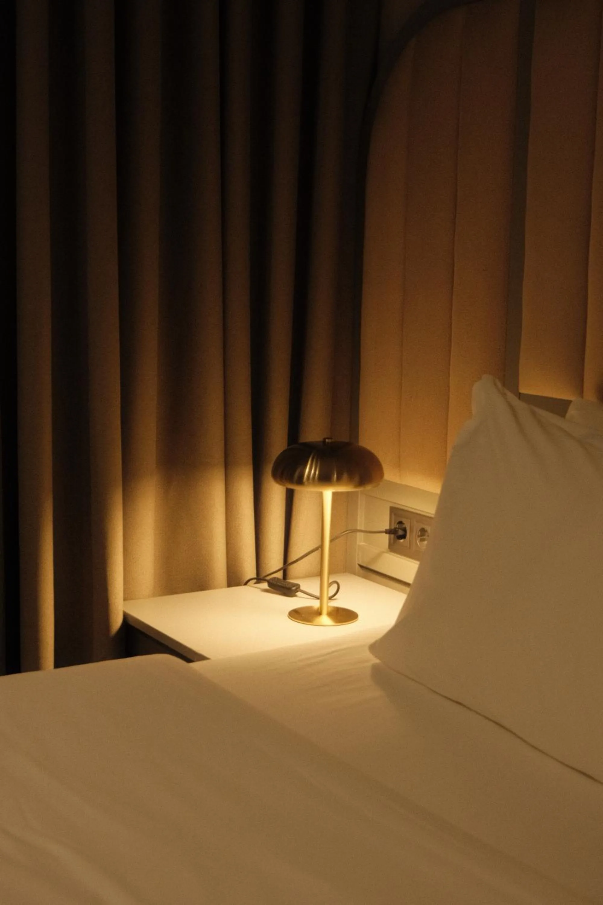 Bed in STROFI Boutique Hotel