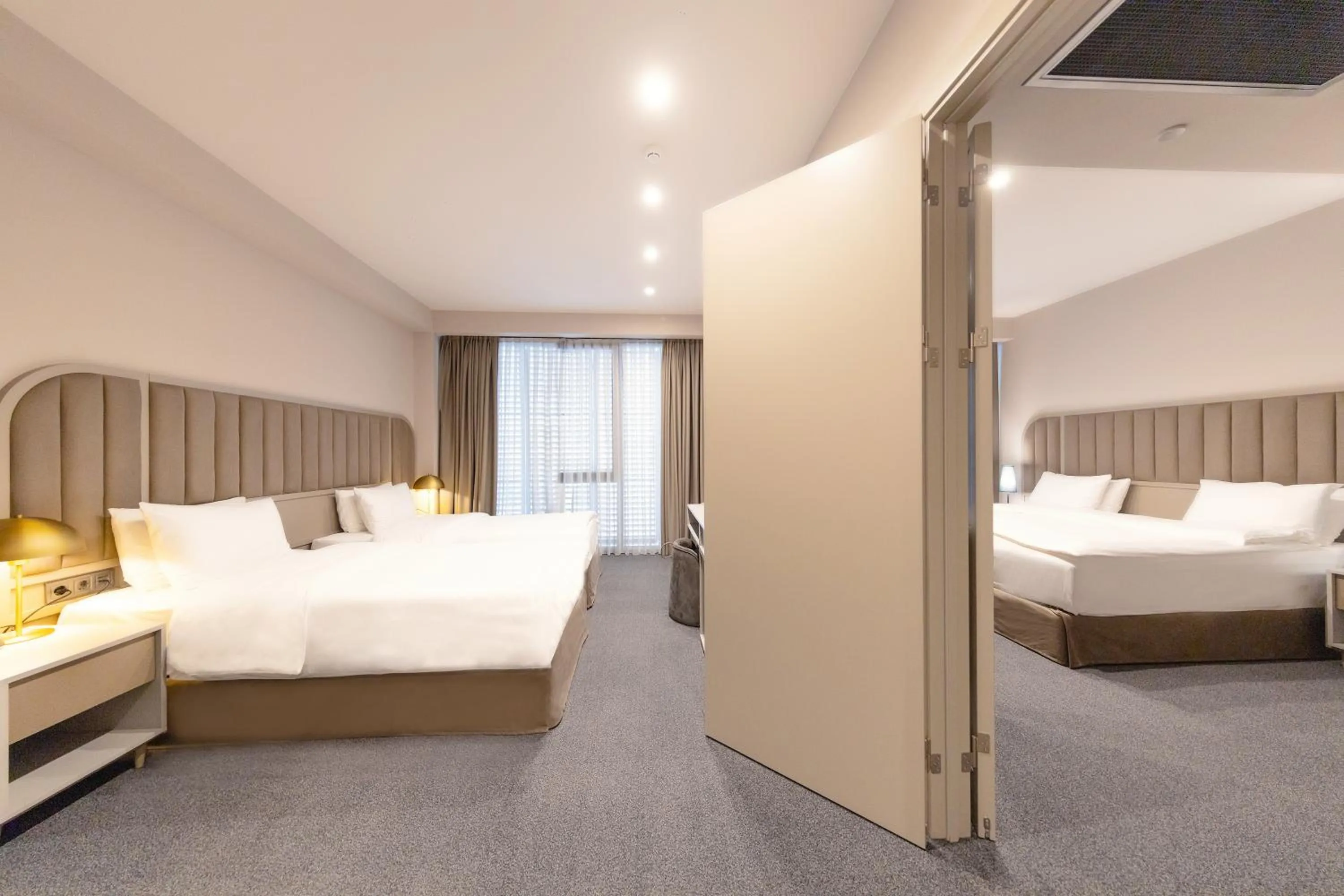 Bed in STROFI Boutique Hotel