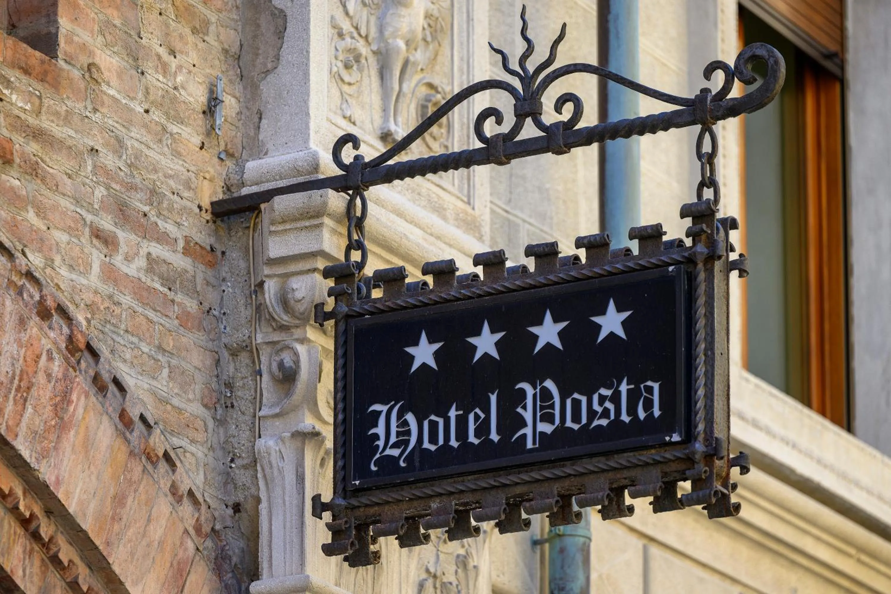 Property logo or sign in Hotel Posta