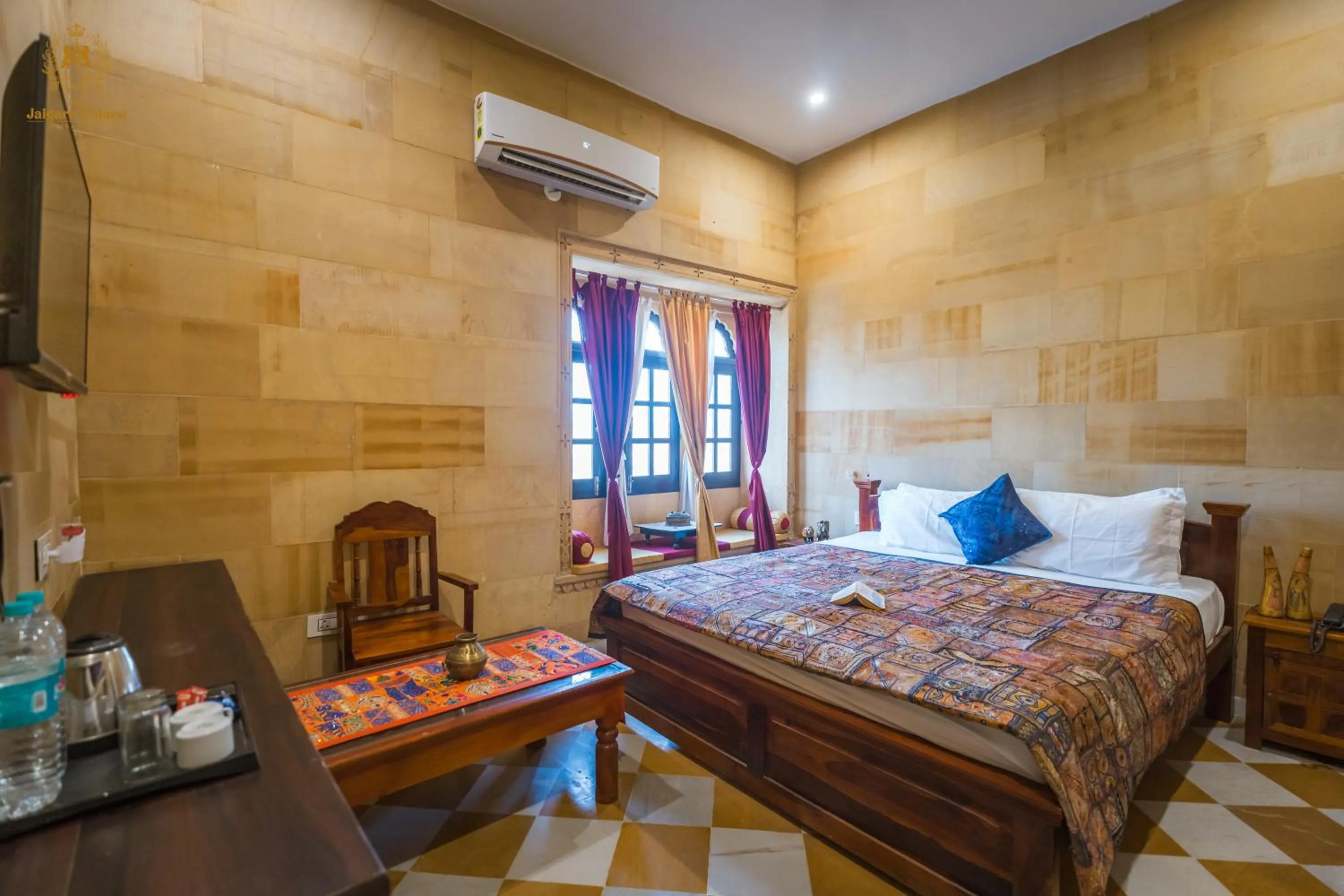 Photo of the whole room, Bed in The Jaigarh Palace Jaisalmer
