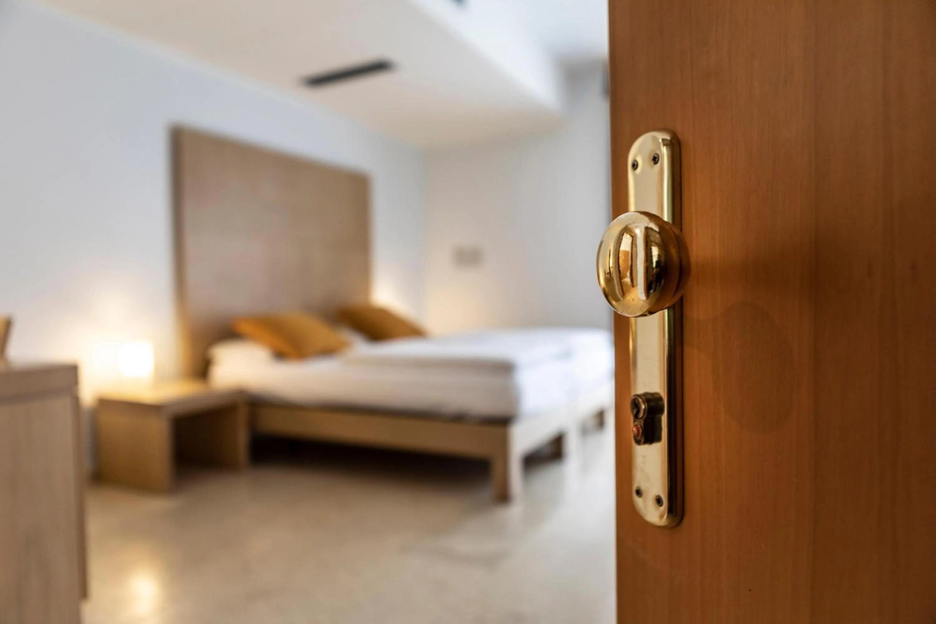 Bed in Hotel Garnì Orchidea