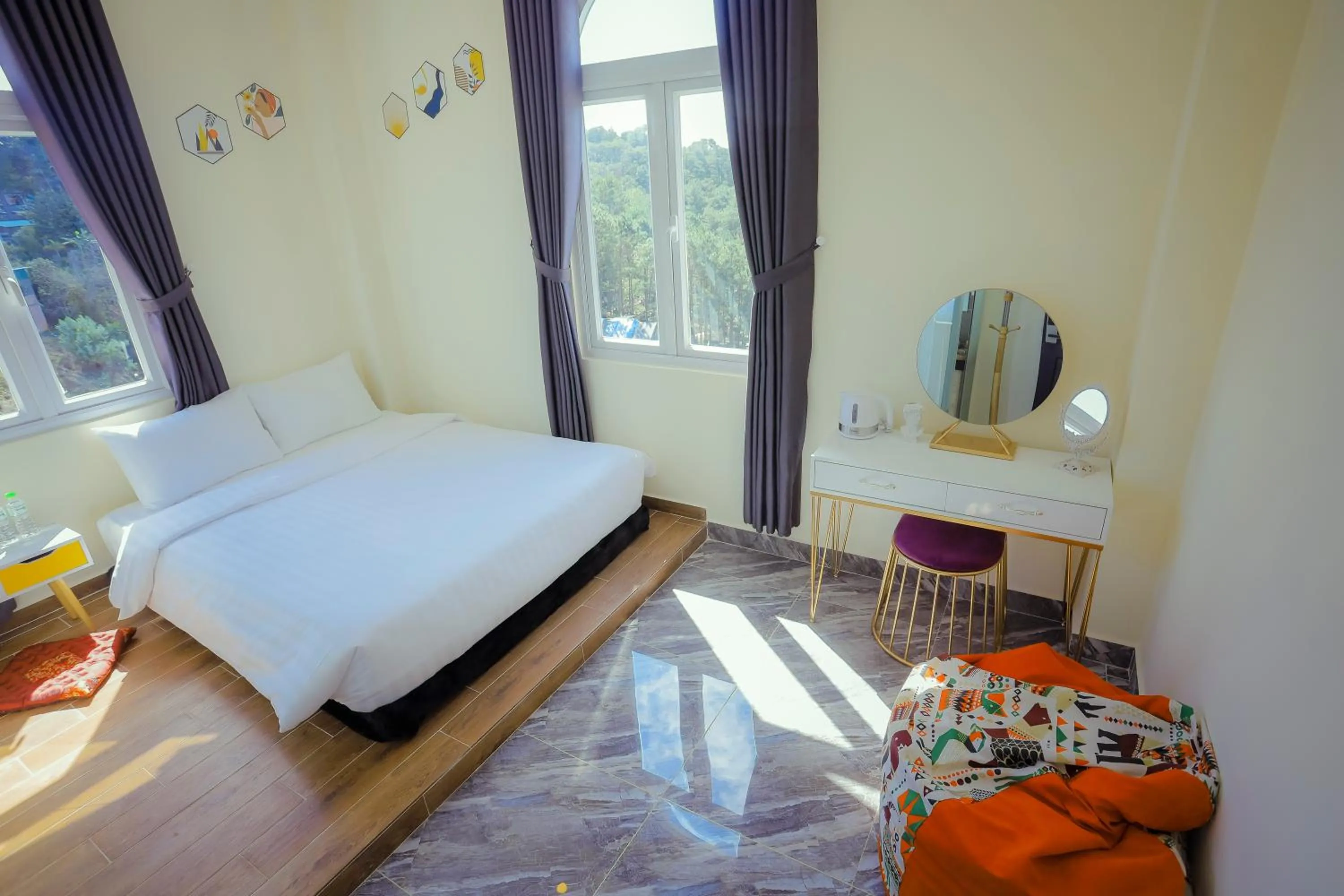 Bed in SHIN VILLAGE HOTEL