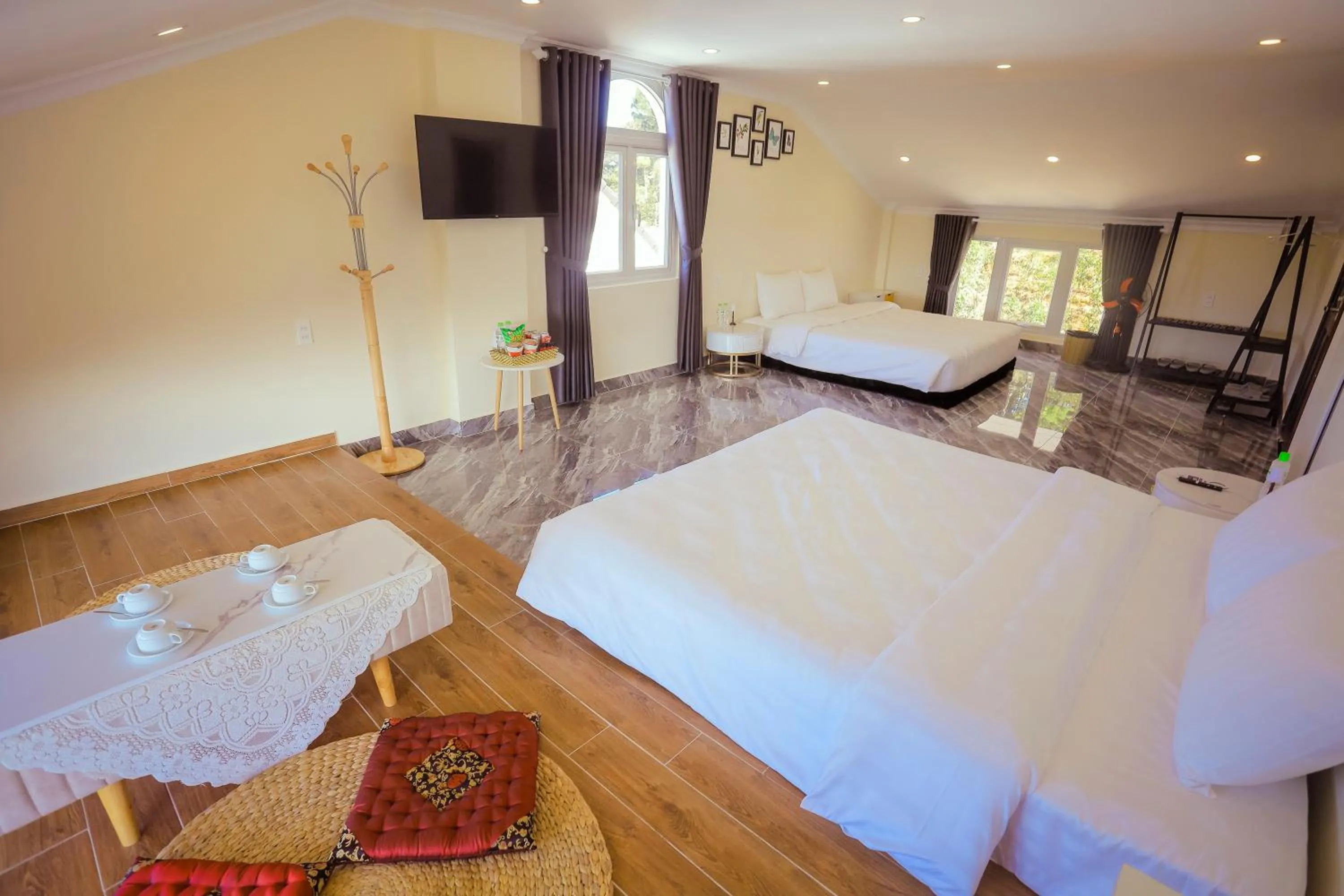 Bed in SHIN VILLAGE HOTEL