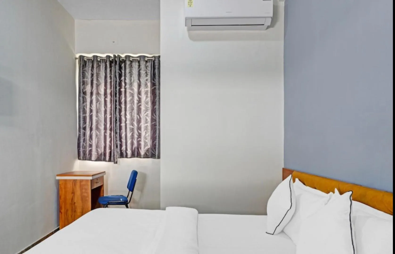 Bed in Hotel Santeria Inn, Best Luxurious Hotel AC Rooms In Surat