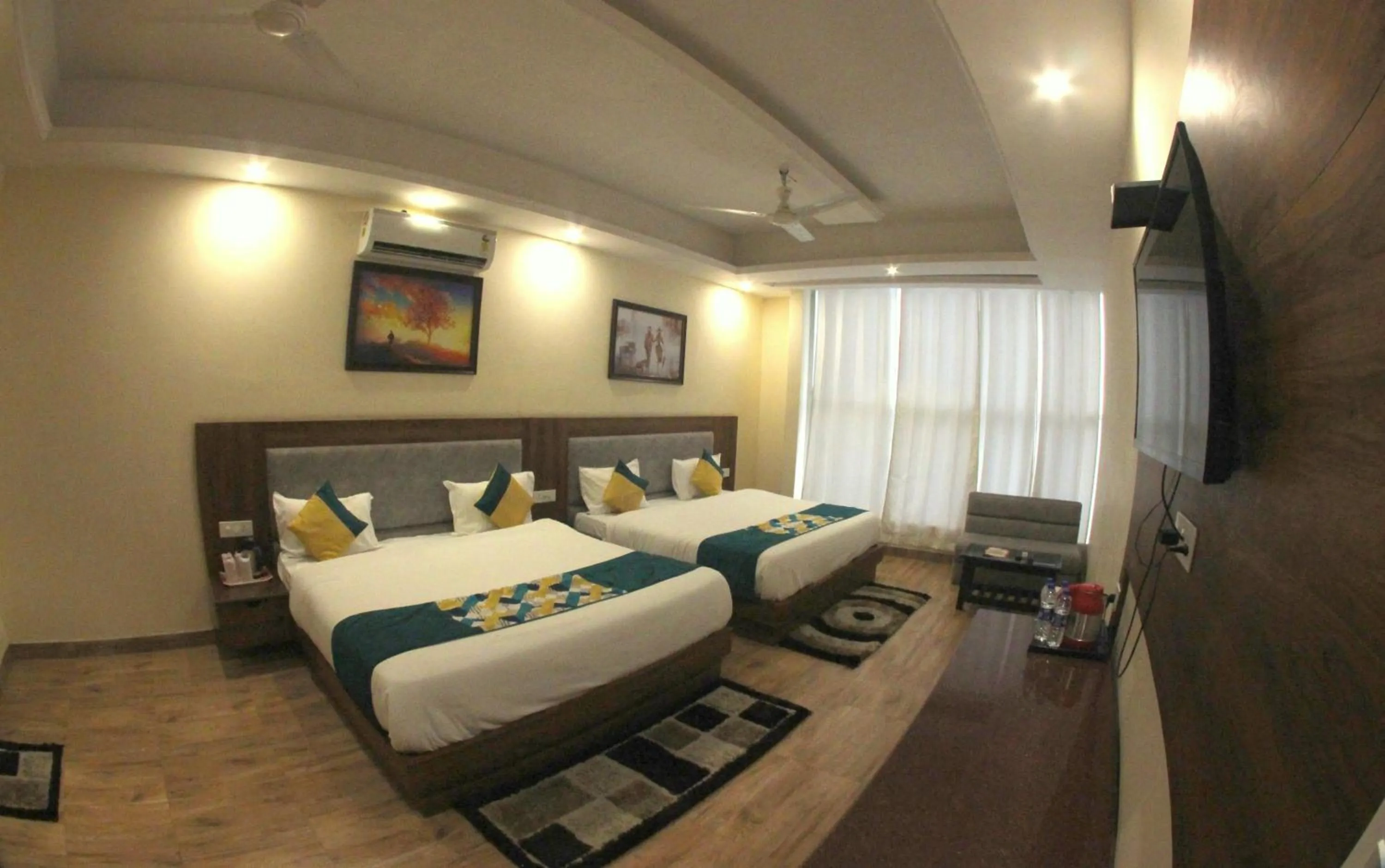 Photo of the whole room, Bed in The Royal Bhumesh