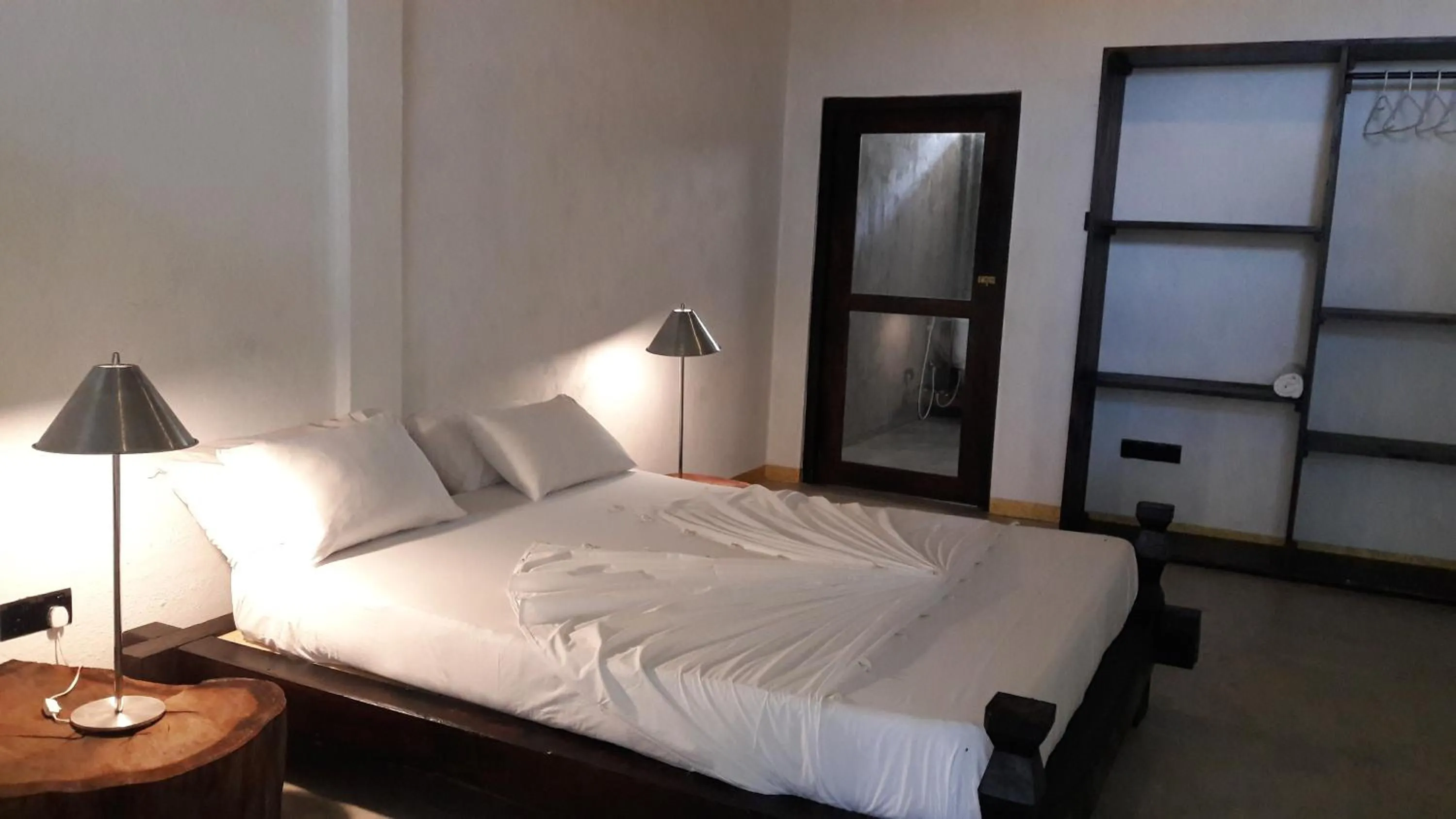 Bed in CocoVilla Boutique Resort