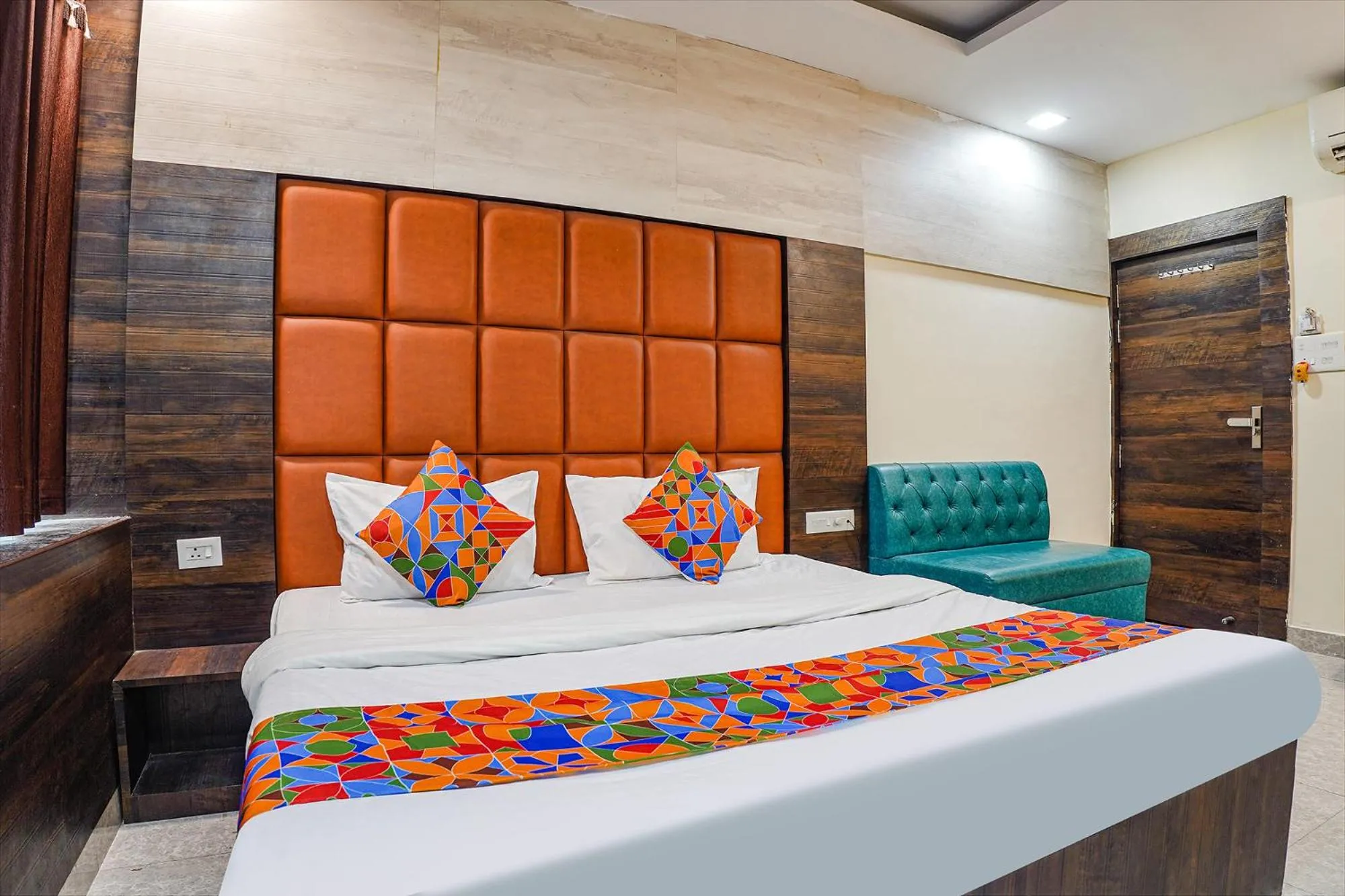 Bed in FabHotel Brij Residency