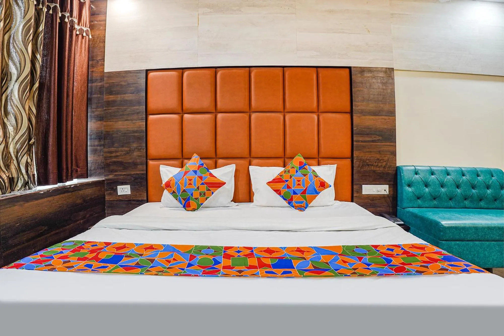 Bed in FabHotel Brij Residency