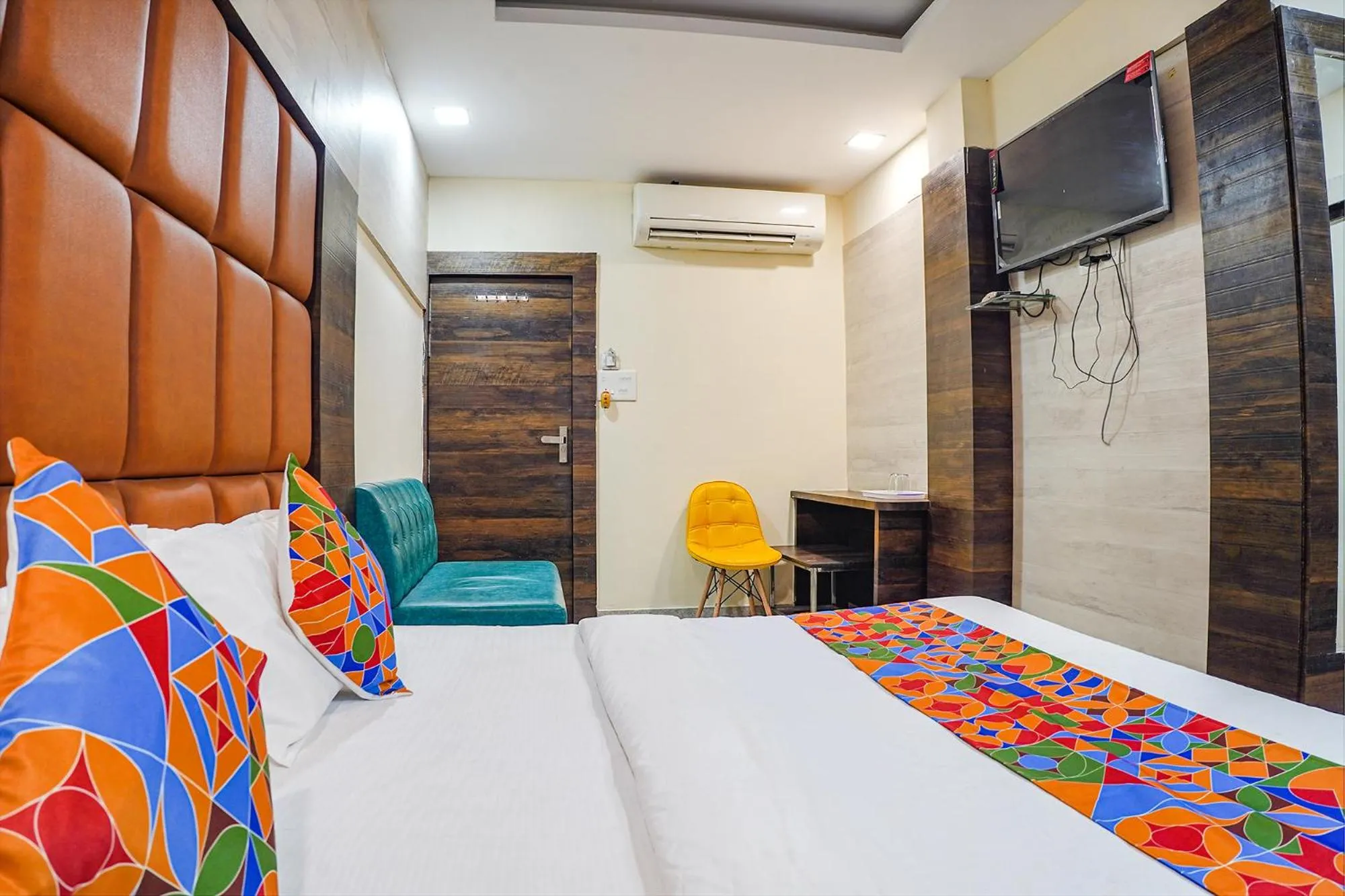 Bed in FabHotel Brij Residency
