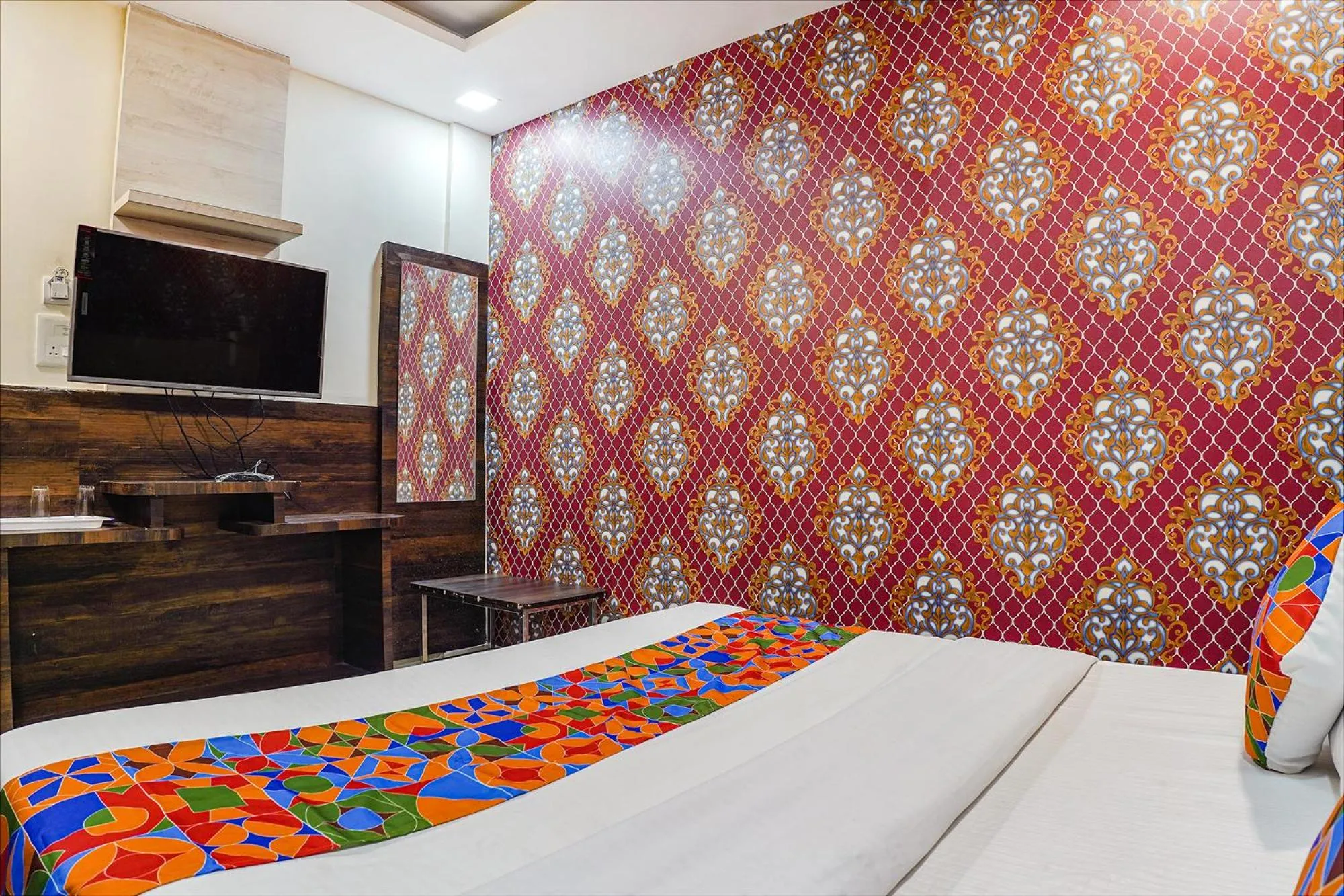 Bed in FabHotel Brij Residency