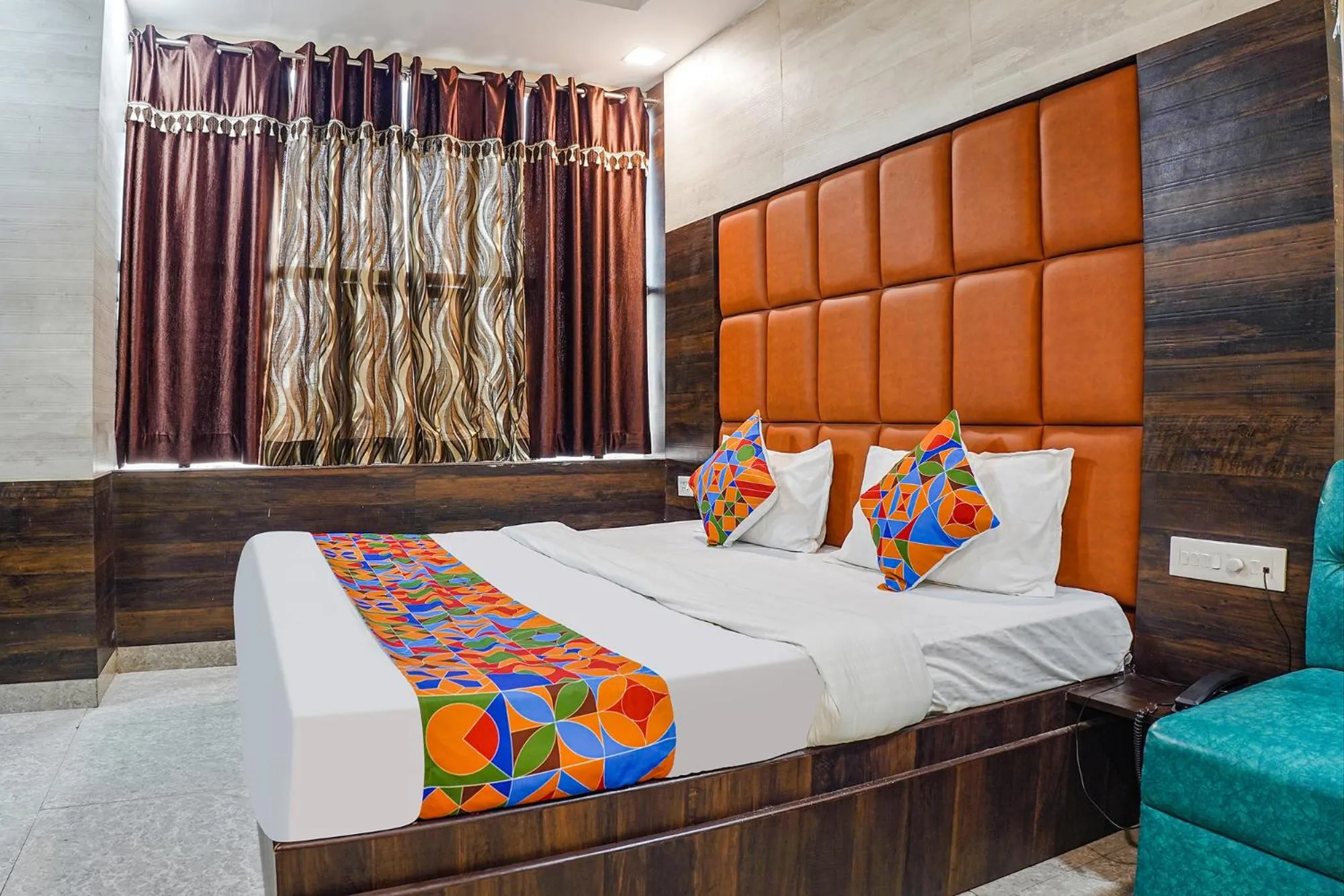 Bed in FabHotel Brij Residency