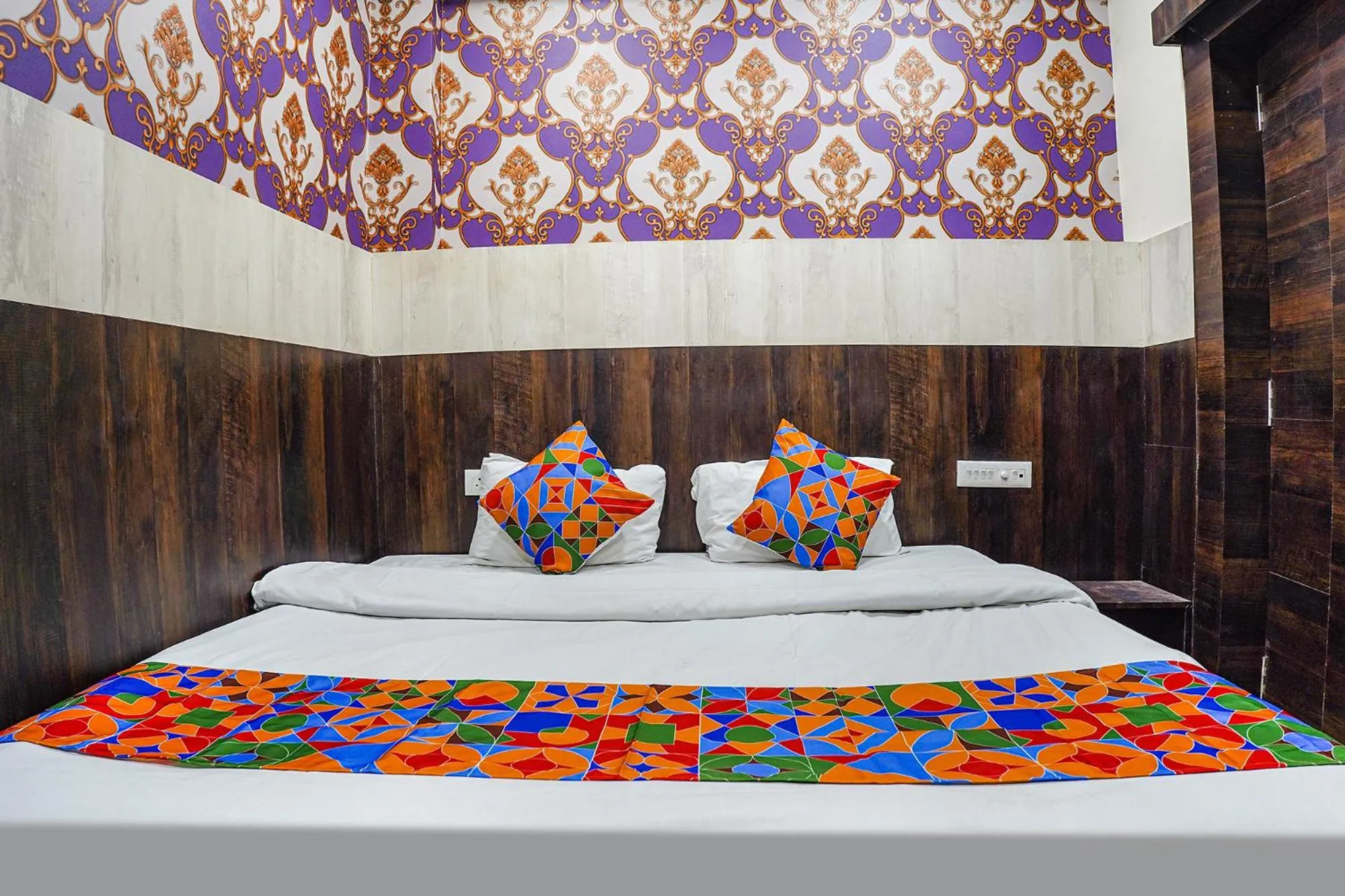 Bed in FabHotel Brij Residency