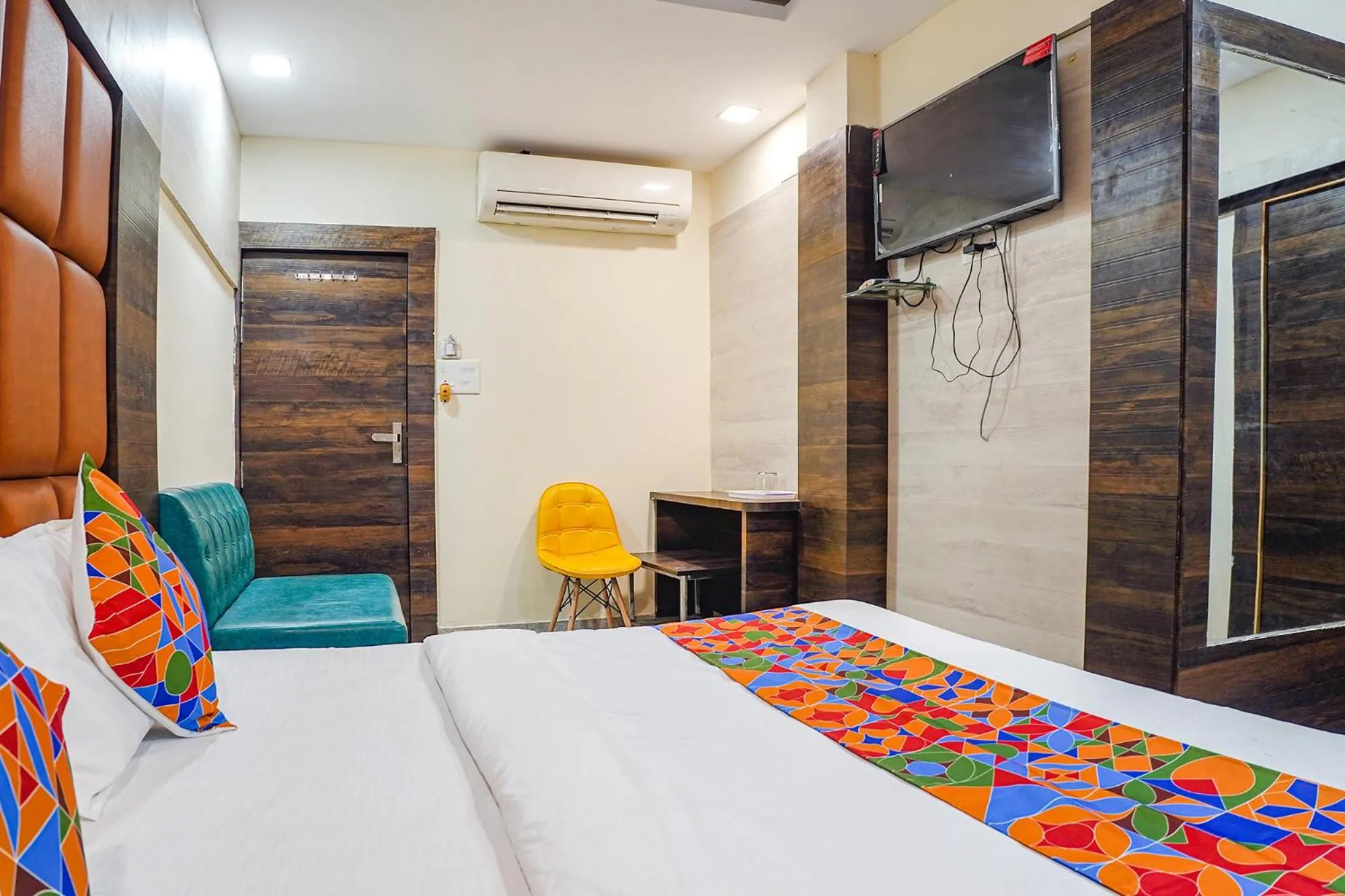 Bed in FabHotel Brij Residency