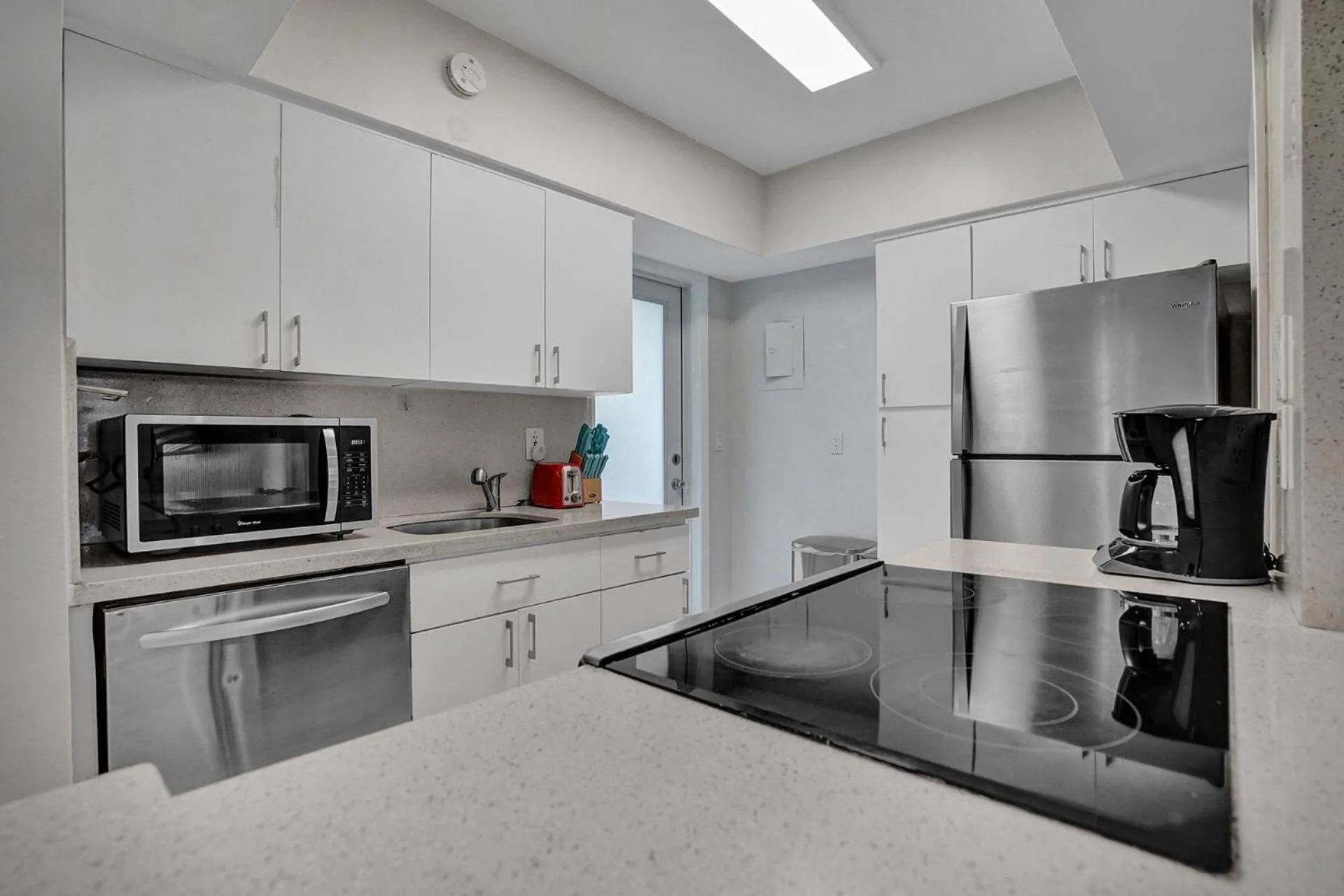 Kitchen or kitchenette in Bay Harbor Suites