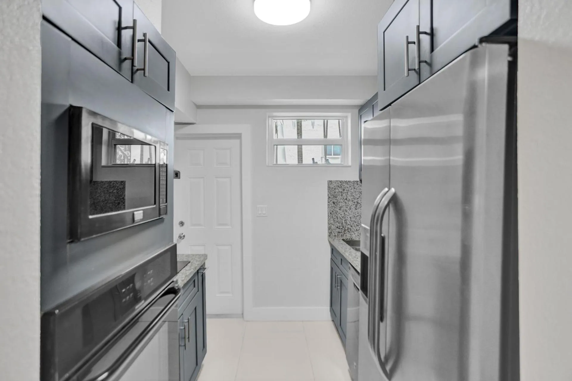 Kitchen or kitchenette in Bay Harbor Suites