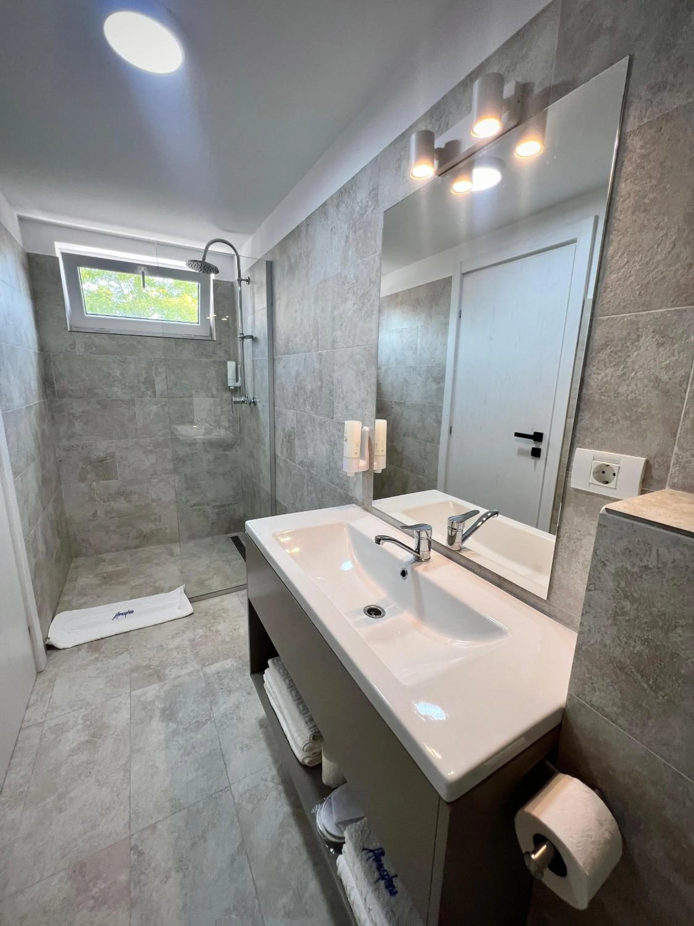 Shower in Atmosphere by the Sea