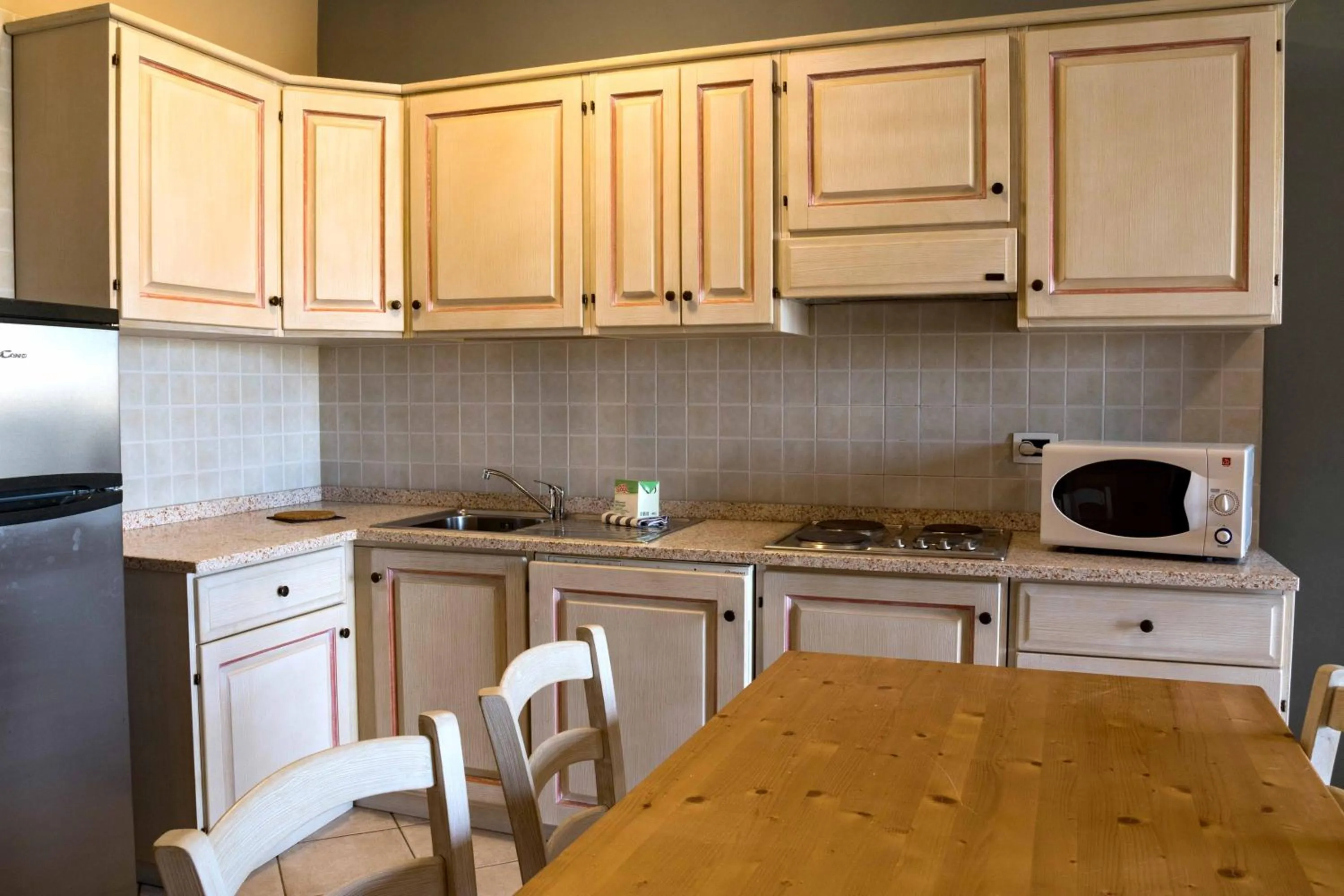 Kitchen or kitchenette in Le Residenze di Santa Costanza - Le Dimore