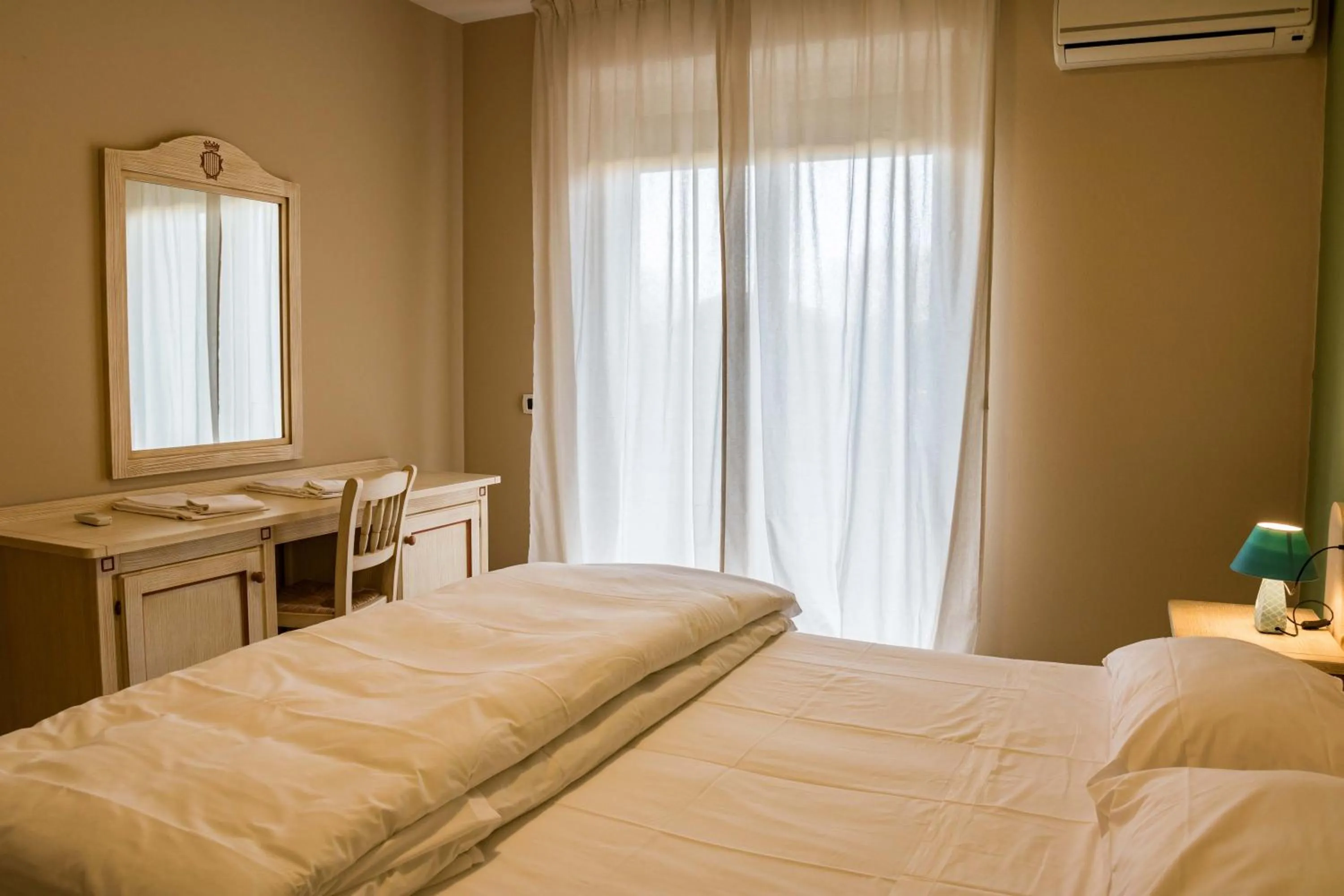 Bed in Le Residenze di Santa Costanza - Le Dimore