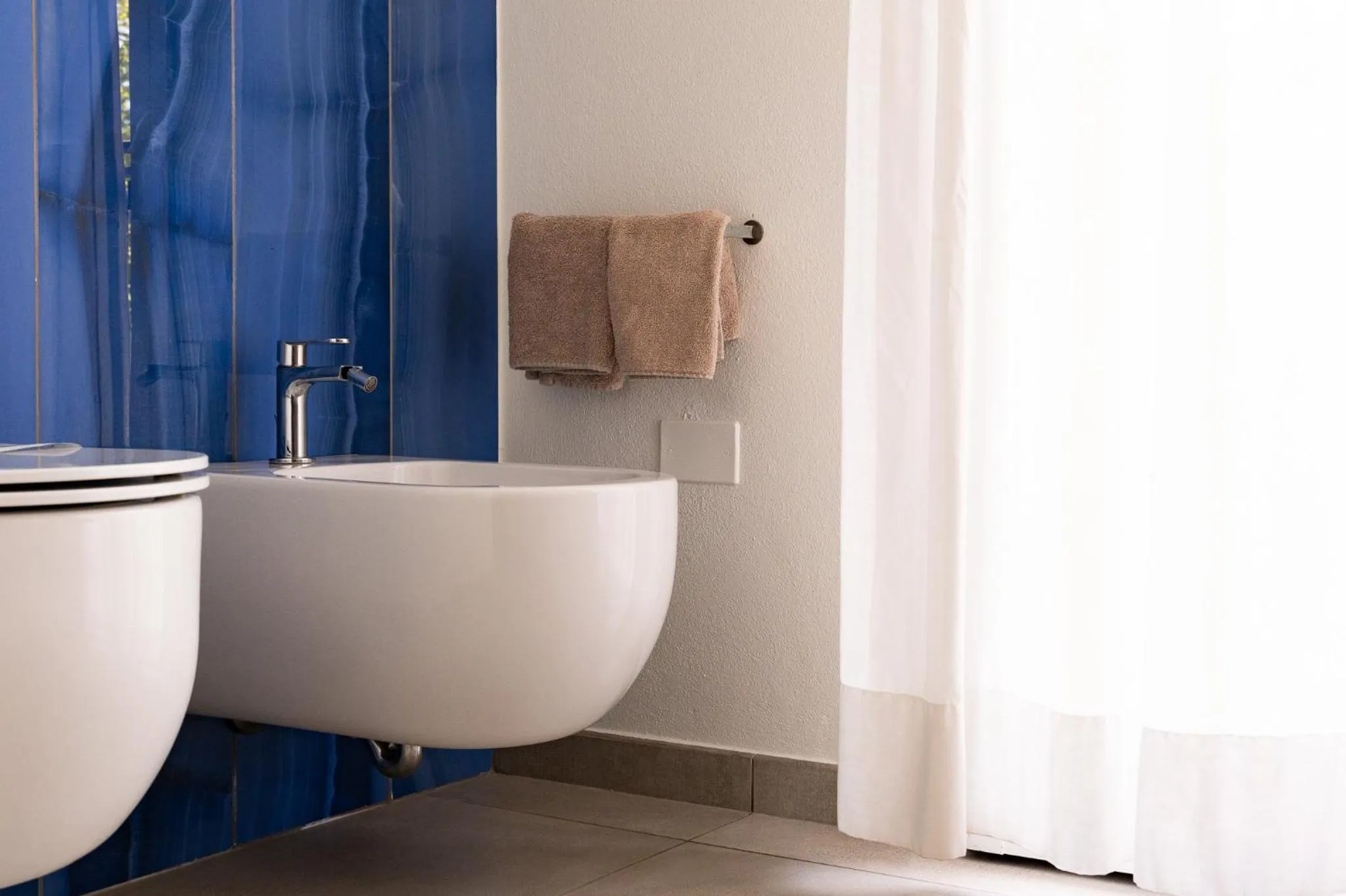 Bathroom in Hotel Corallo