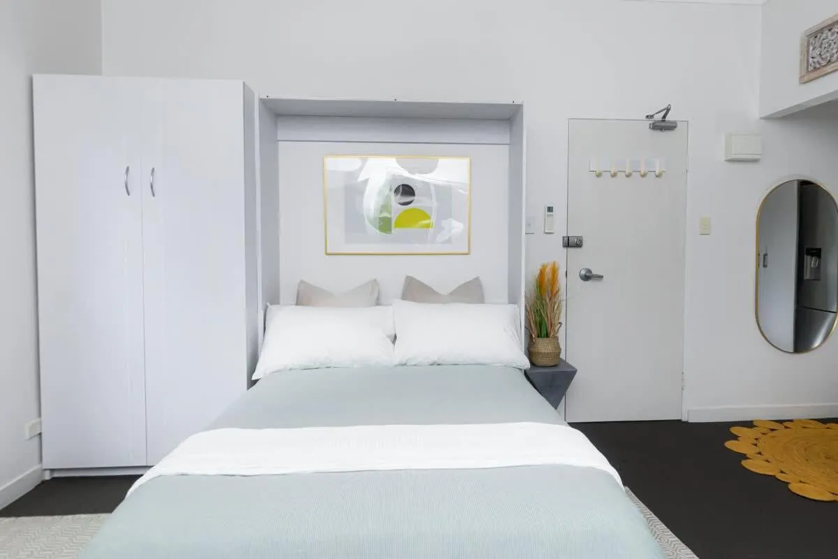 Bright Beachfront Studio with Terrace & Aircon