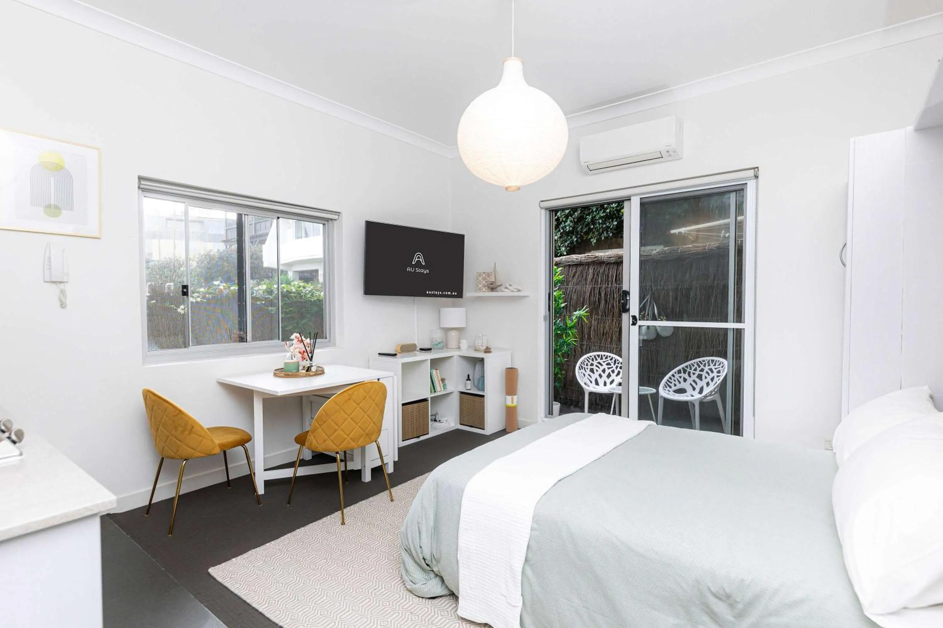 Bright Beachfront Studio with Terrace & Aircon