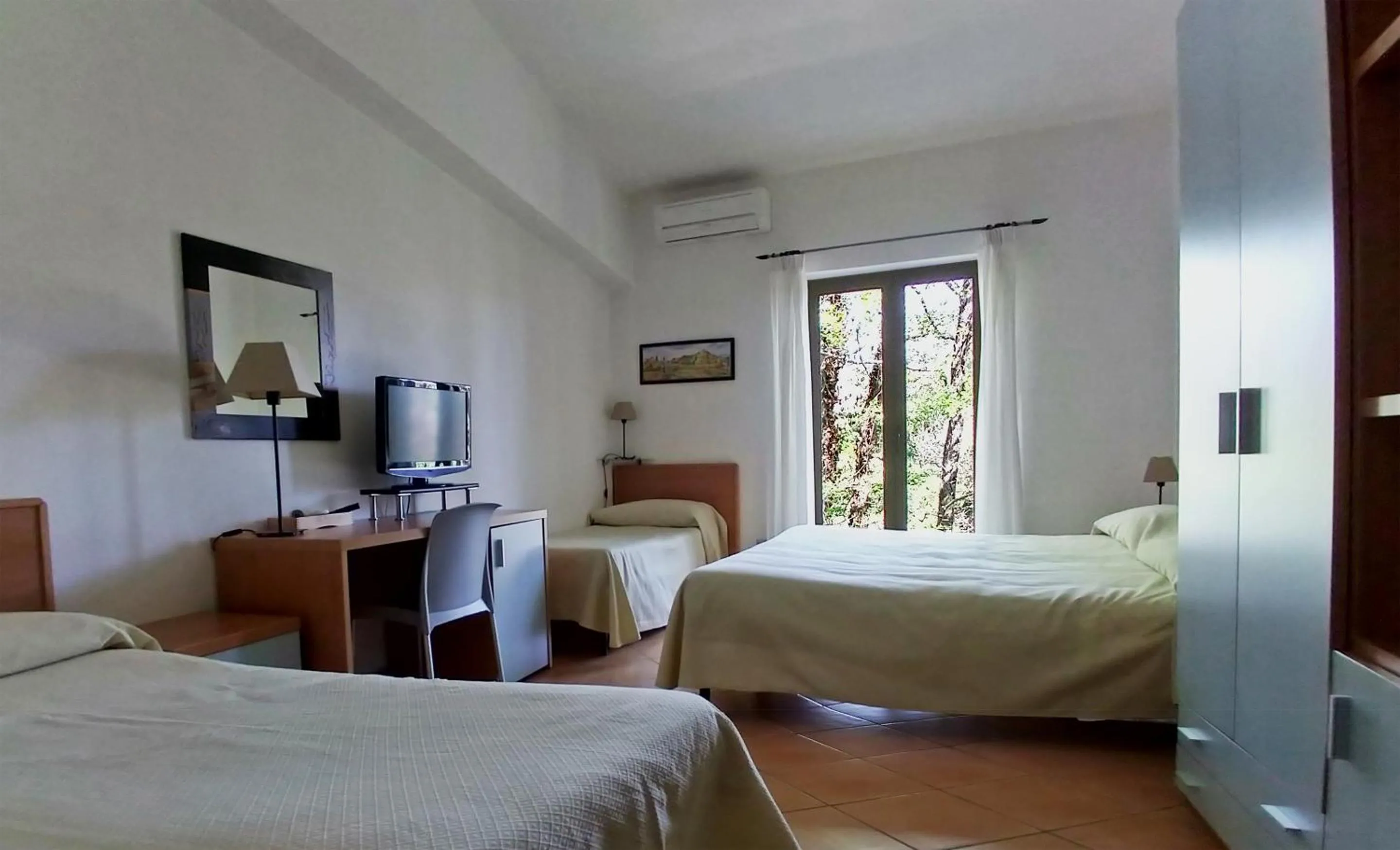 Quadruple Room in Verdeblu Country Hotel