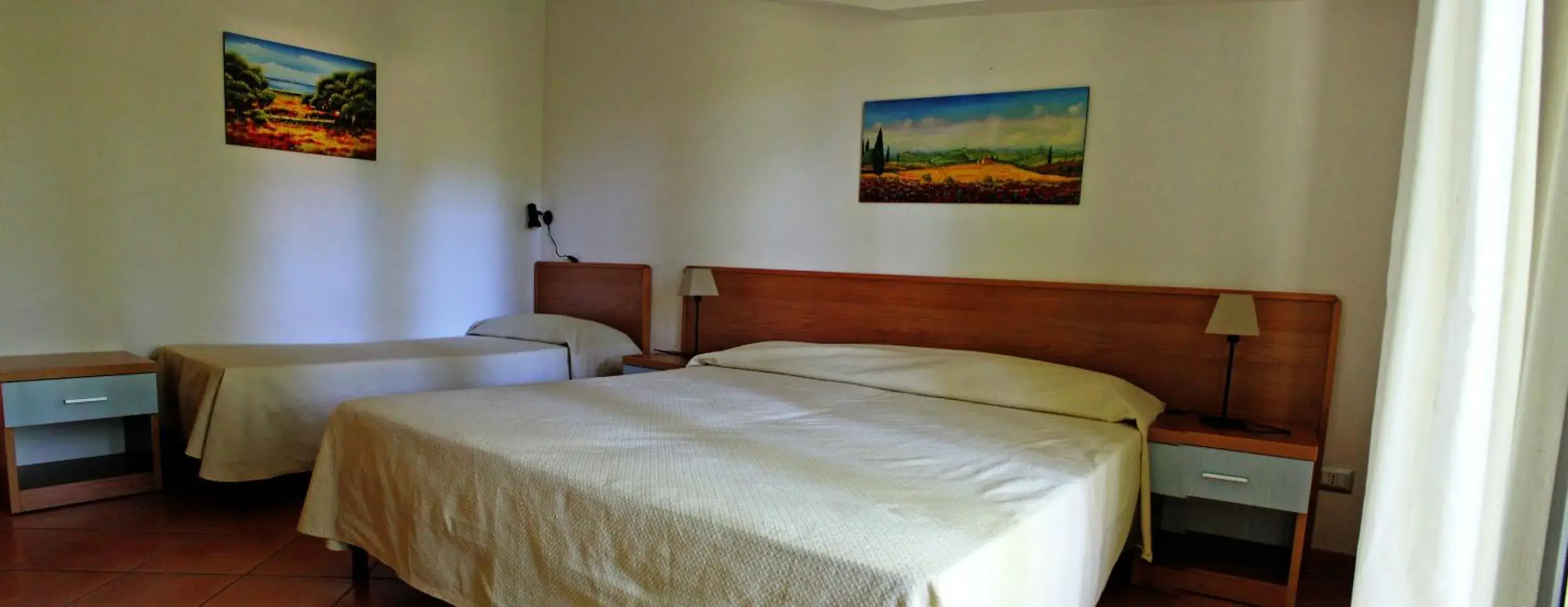 Triple Room with Garden View in Verdeblu Country Hotel Triple Room with Garden View in Verdeblu Country Hotel