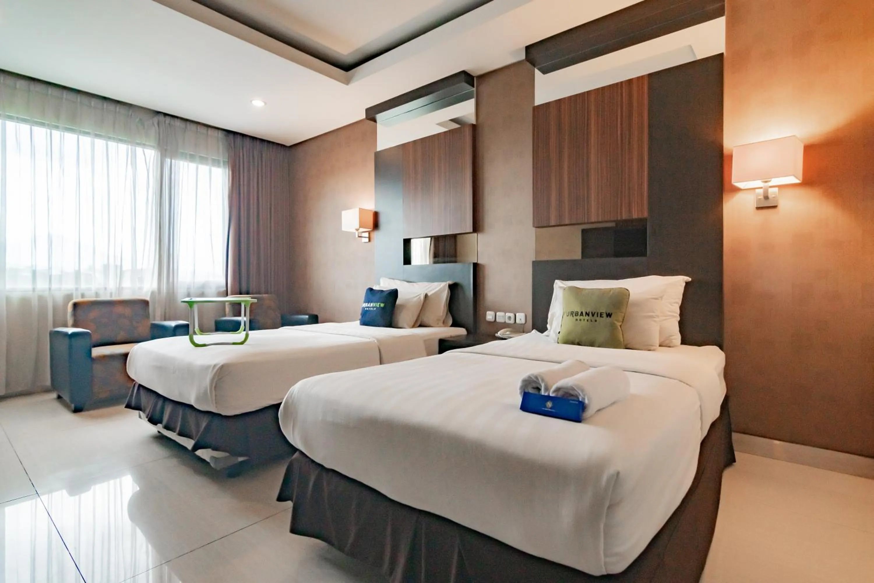 Bedroom, Bed in Urbanview Hotel Newton Riau Bandung by RedDoorz