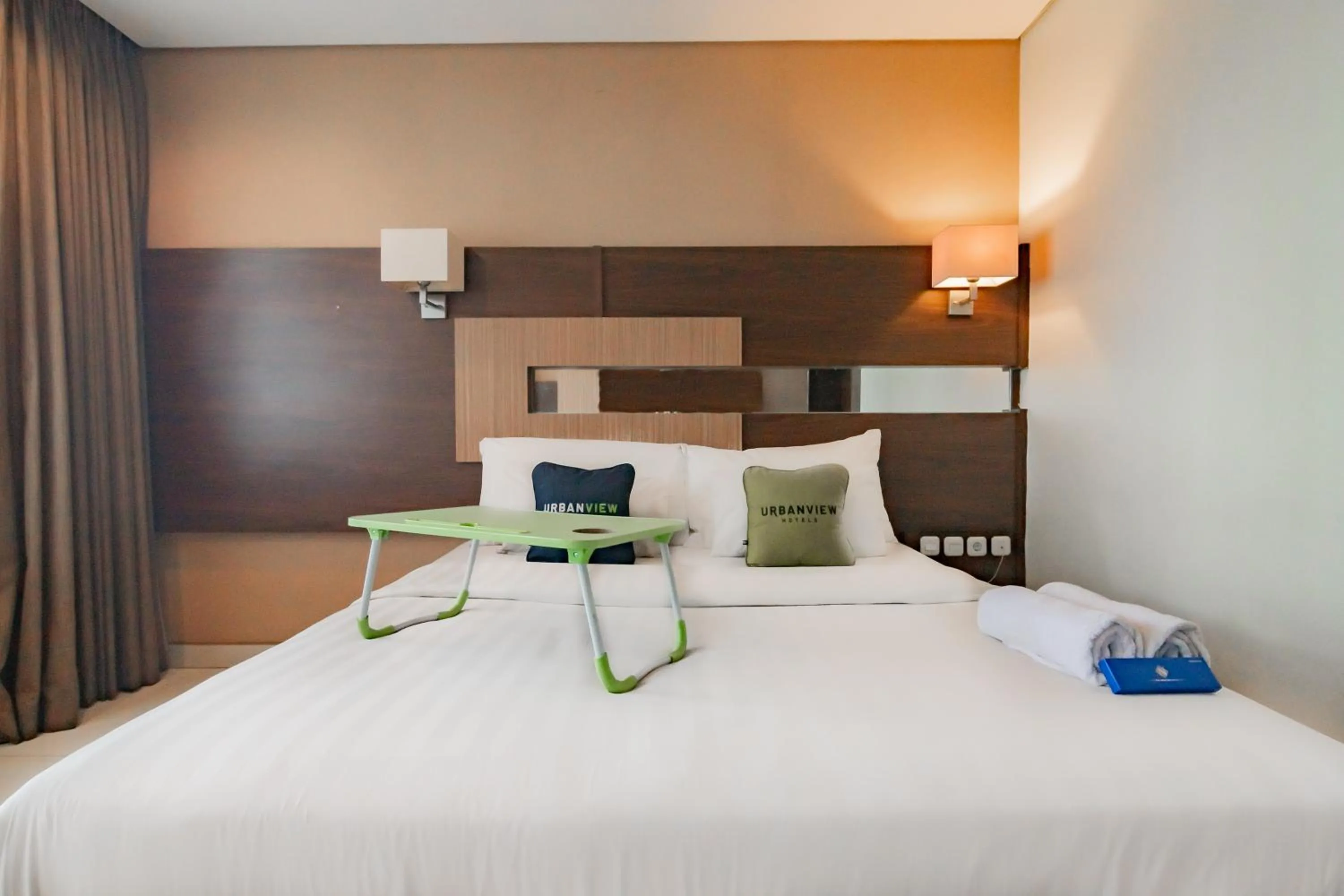 Bed in Urbanview Hotel Newton Riau Bandung by RedDoorz