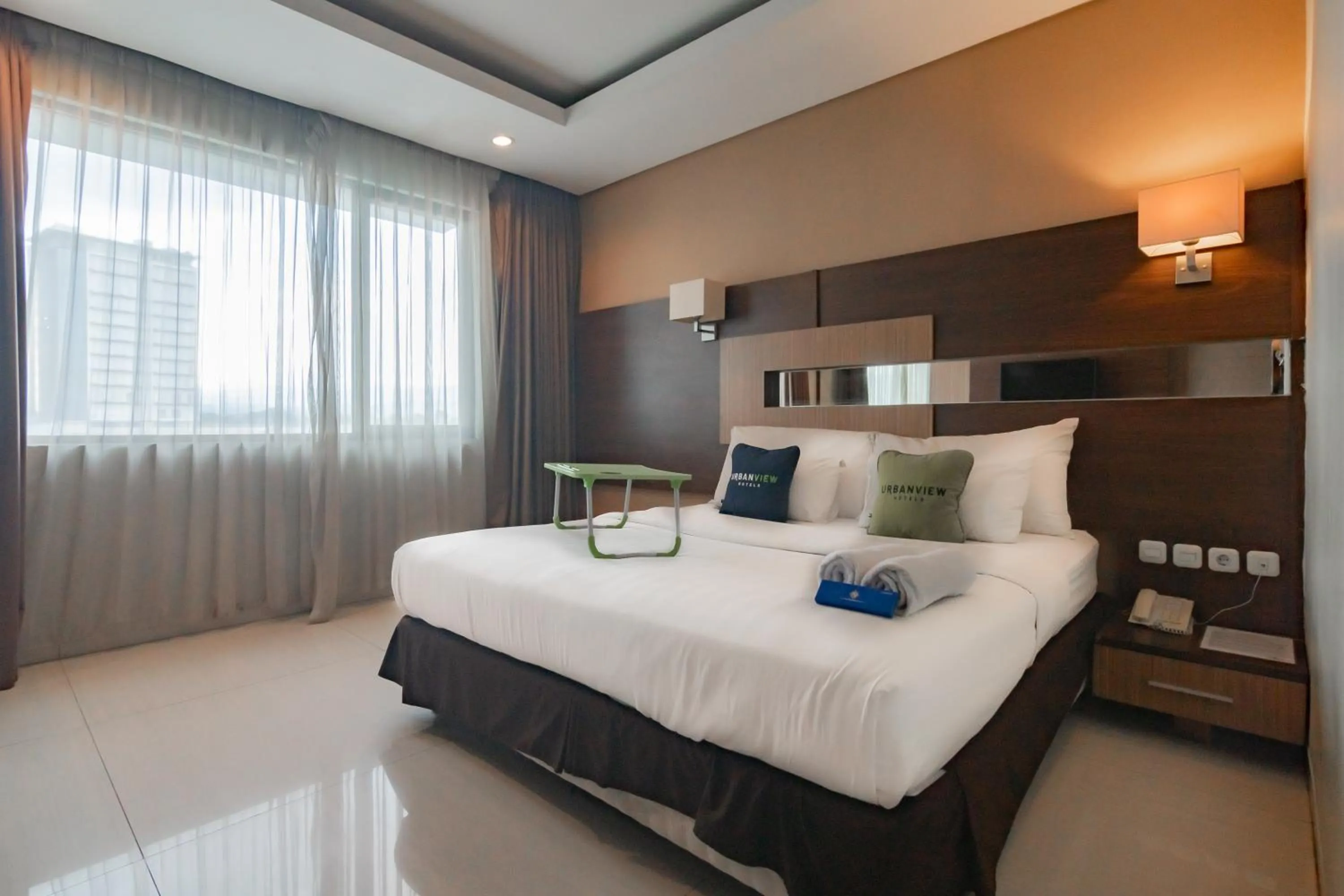 Bedroom, Bed in Urbanview Hotel Newton Riau Bandung by RedDoorz