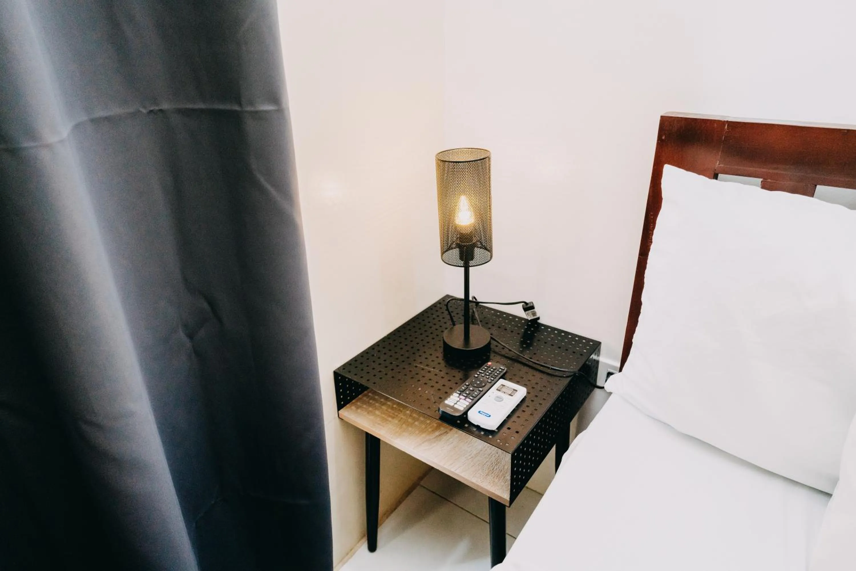 Bed in Nine Balconies Island Stay