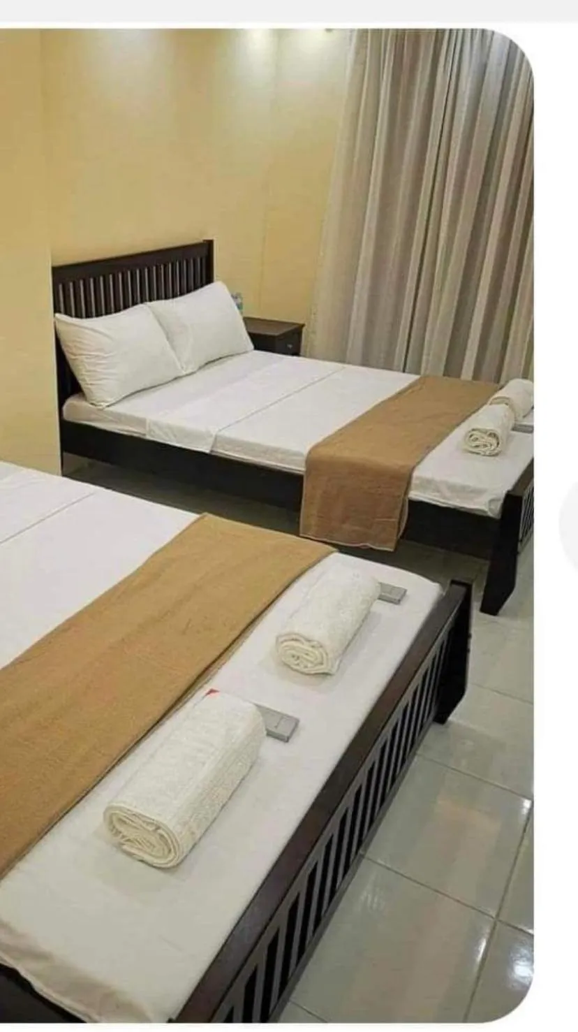 Bed in Nine Balconies Island Stay