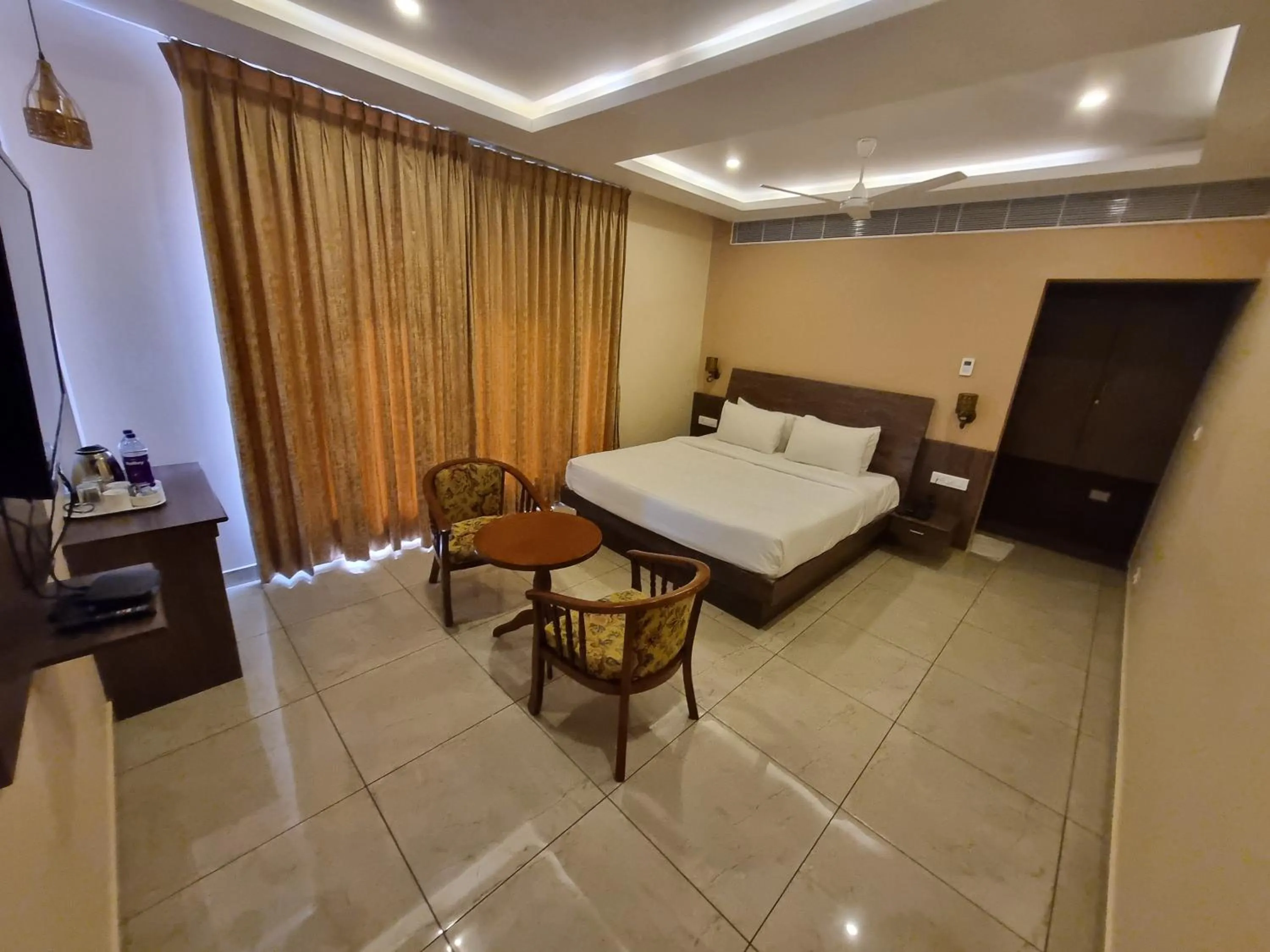 Bed in PLUTUS RESIDENCY